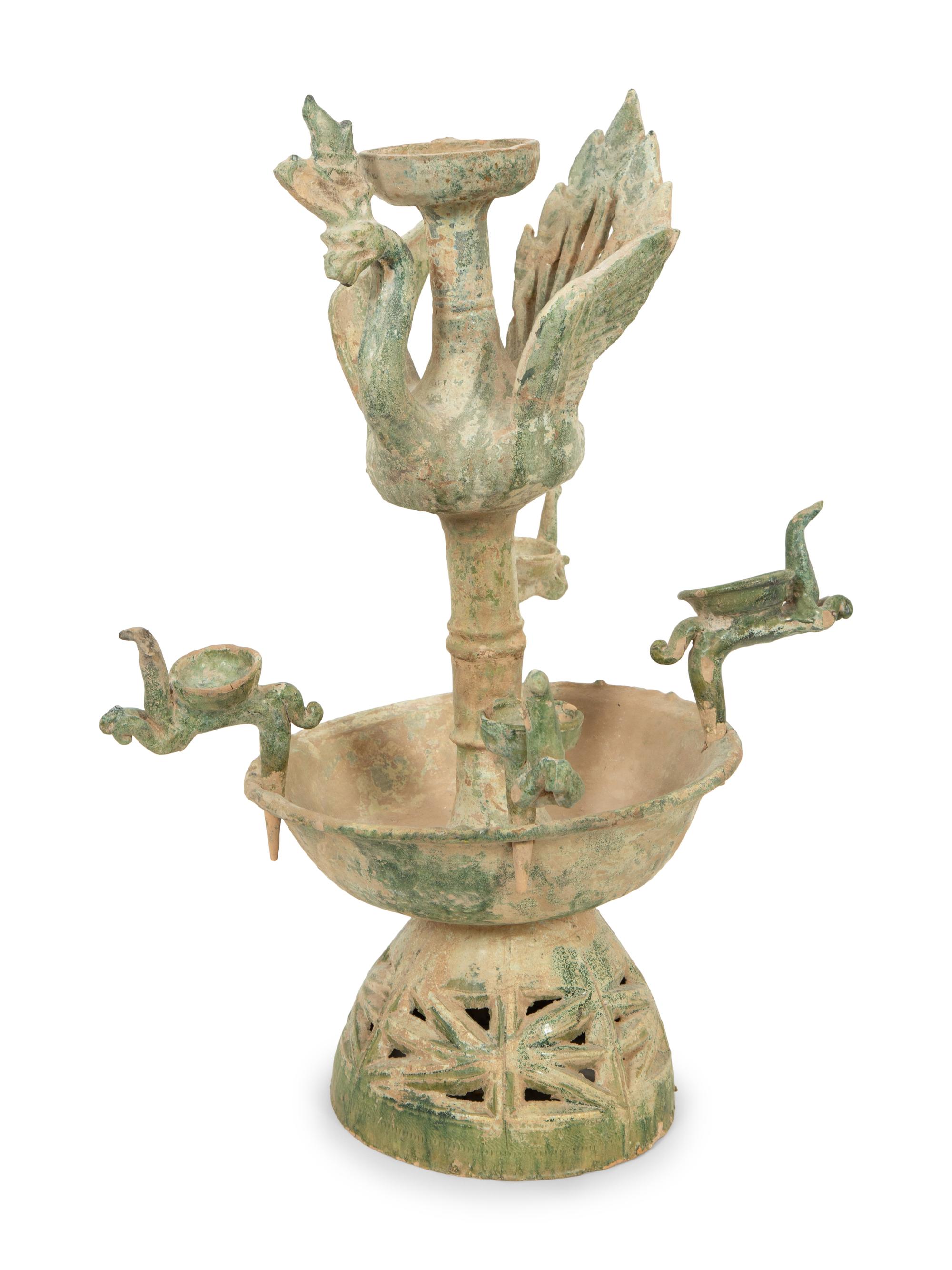 A Han Pottery Phoenix Oil Lamp