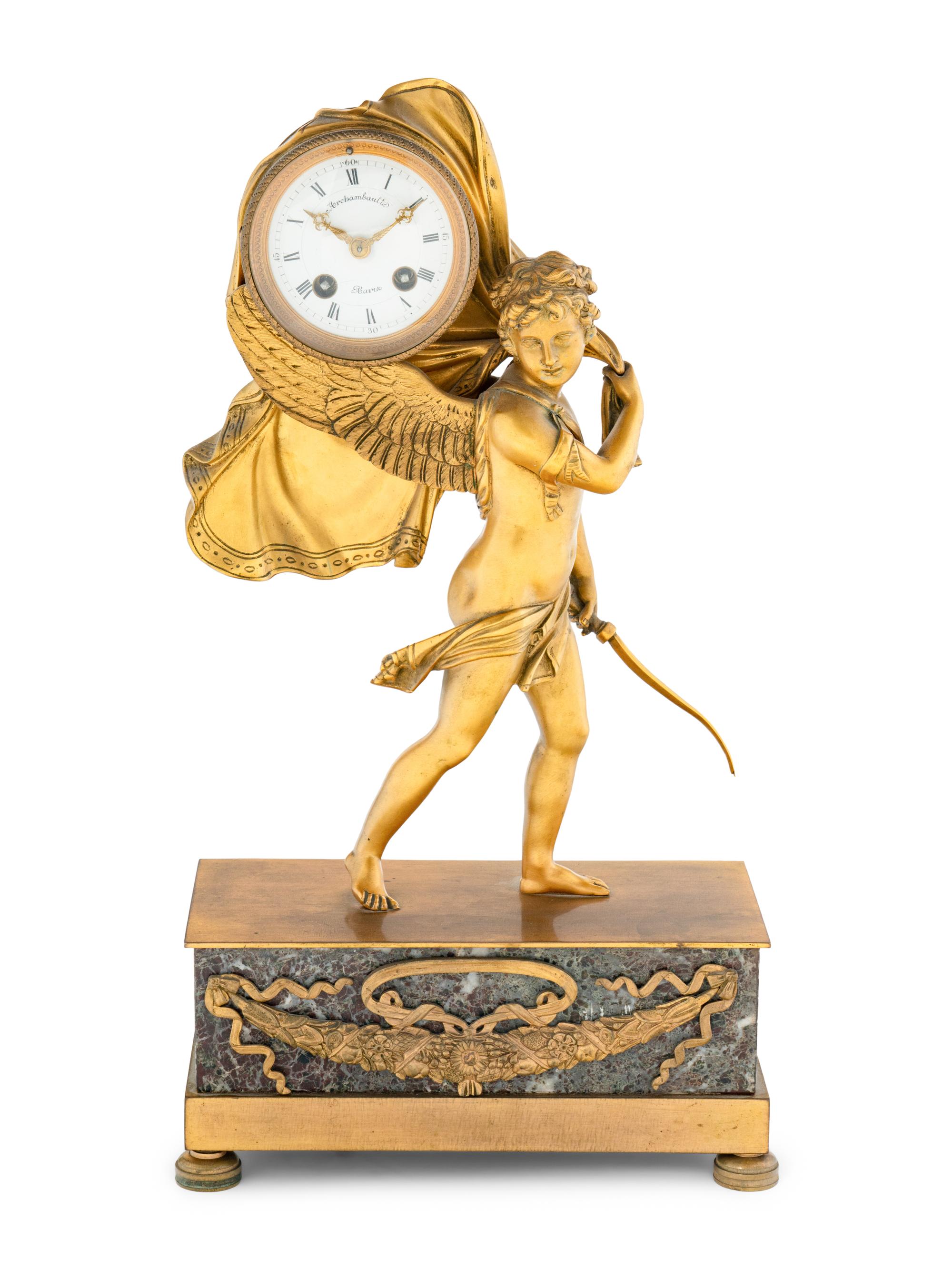 An Empire Style Gilt Bronze and Marble Figural Clock