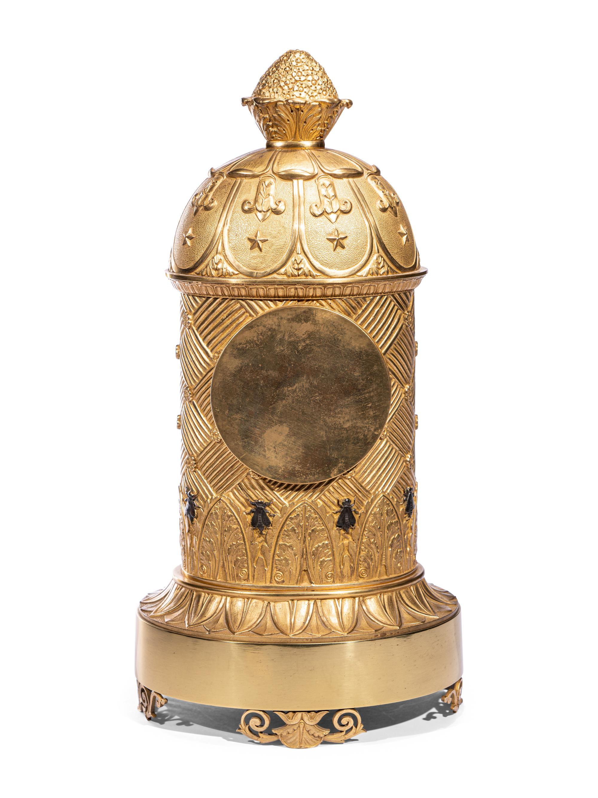 A Charles X Ormolu and Patinated Bronze Beehive Clock