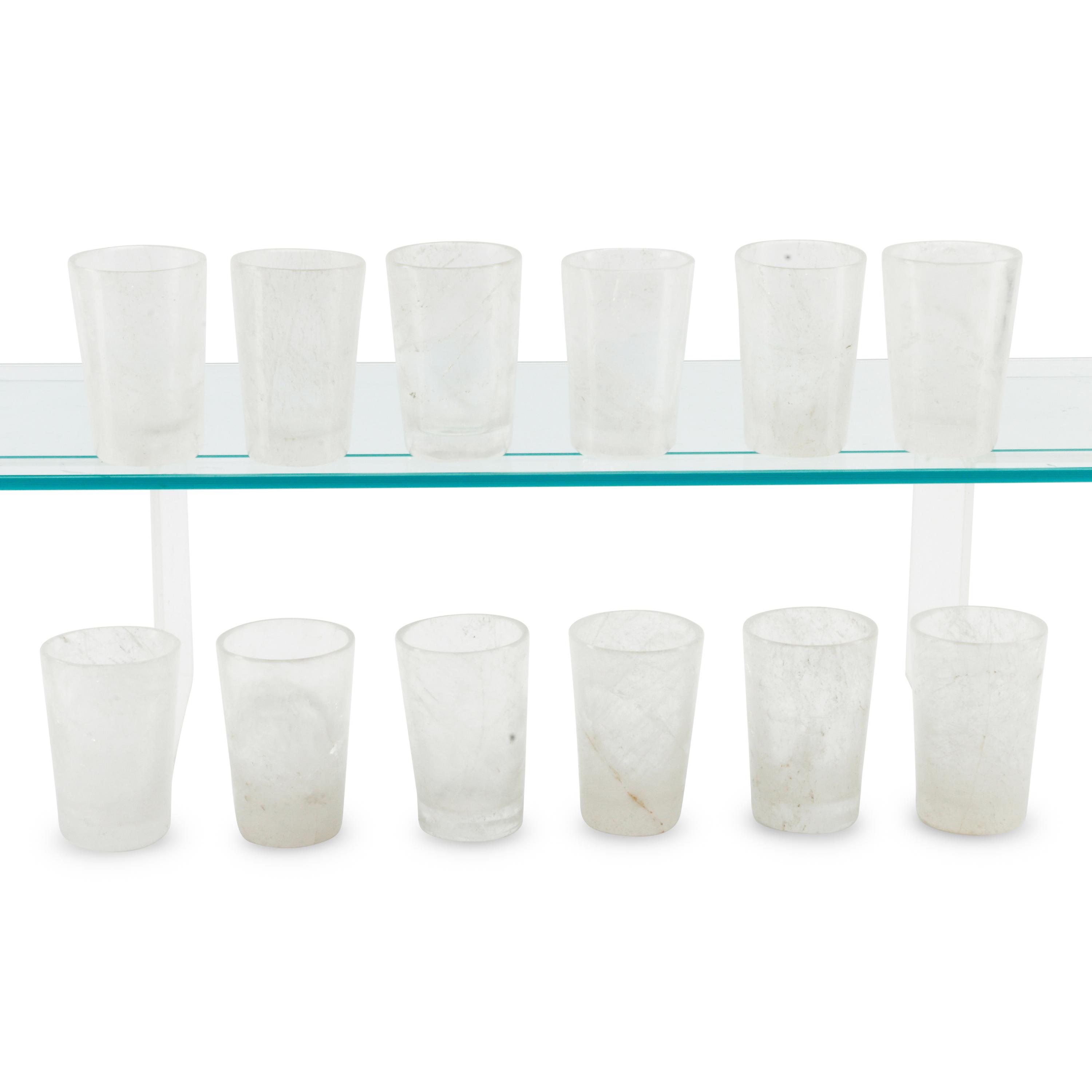 A Set of Twelve Carved Rock Crystal Tumblers