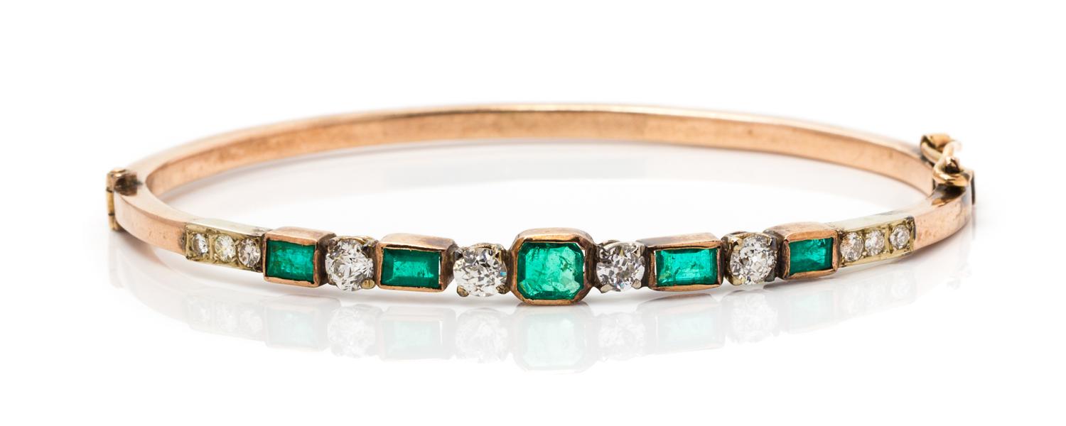 A Rose Gold, Diamond and Emerald Bangle, 8.00 dwts.