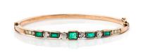 A Rose Gold, Diamond and Emerald Bangle, 8.00 dwts.