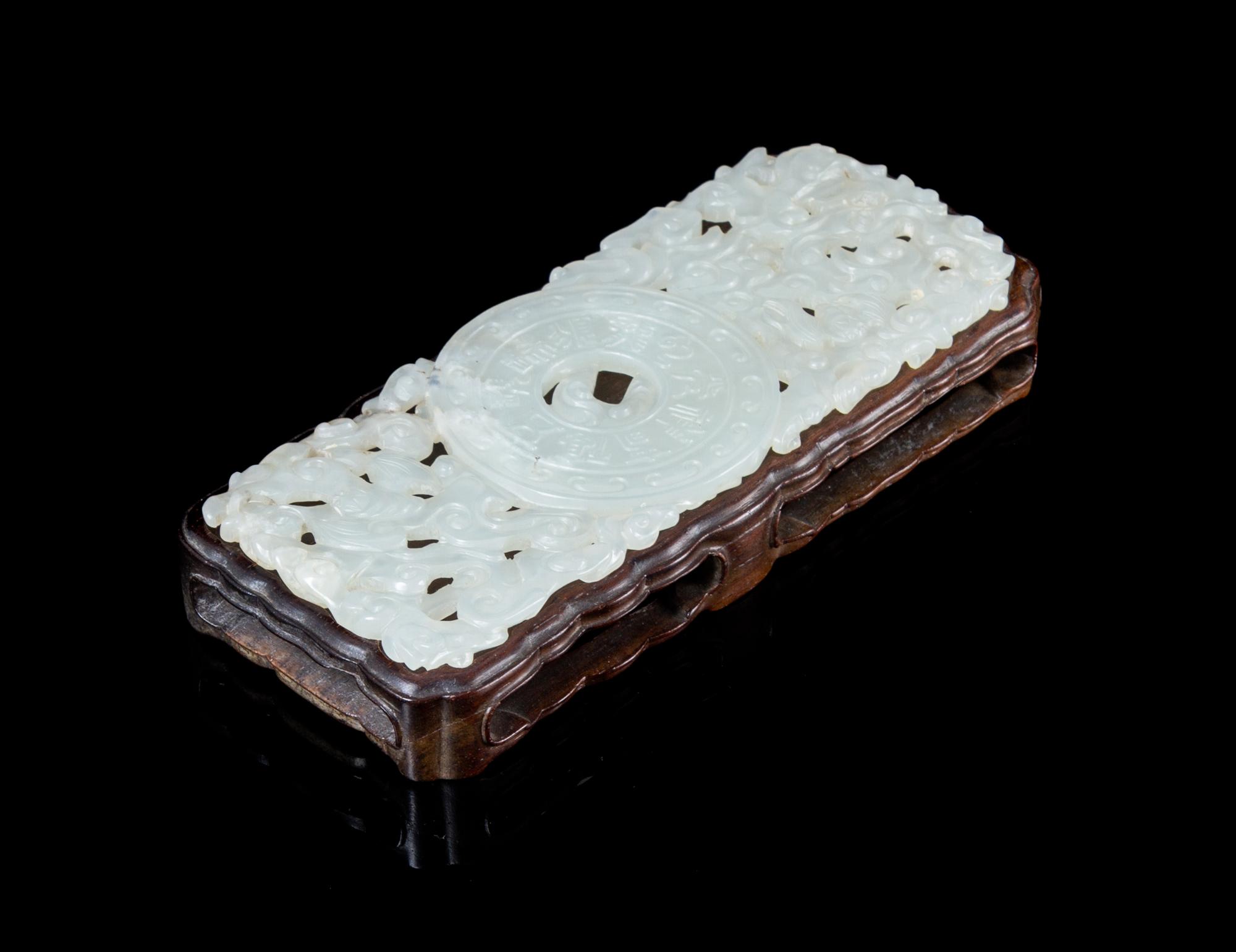 A Pierce Carved Jade Plaque POSSIBLY 18TH/19TH CENTURY Length of jade 5 5/8 inches. — POSSIBLY 18TH/19TH CENTURY