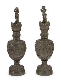 A Pair of Neoclassical Patinated Bronze Ewers with Bacchic Putti