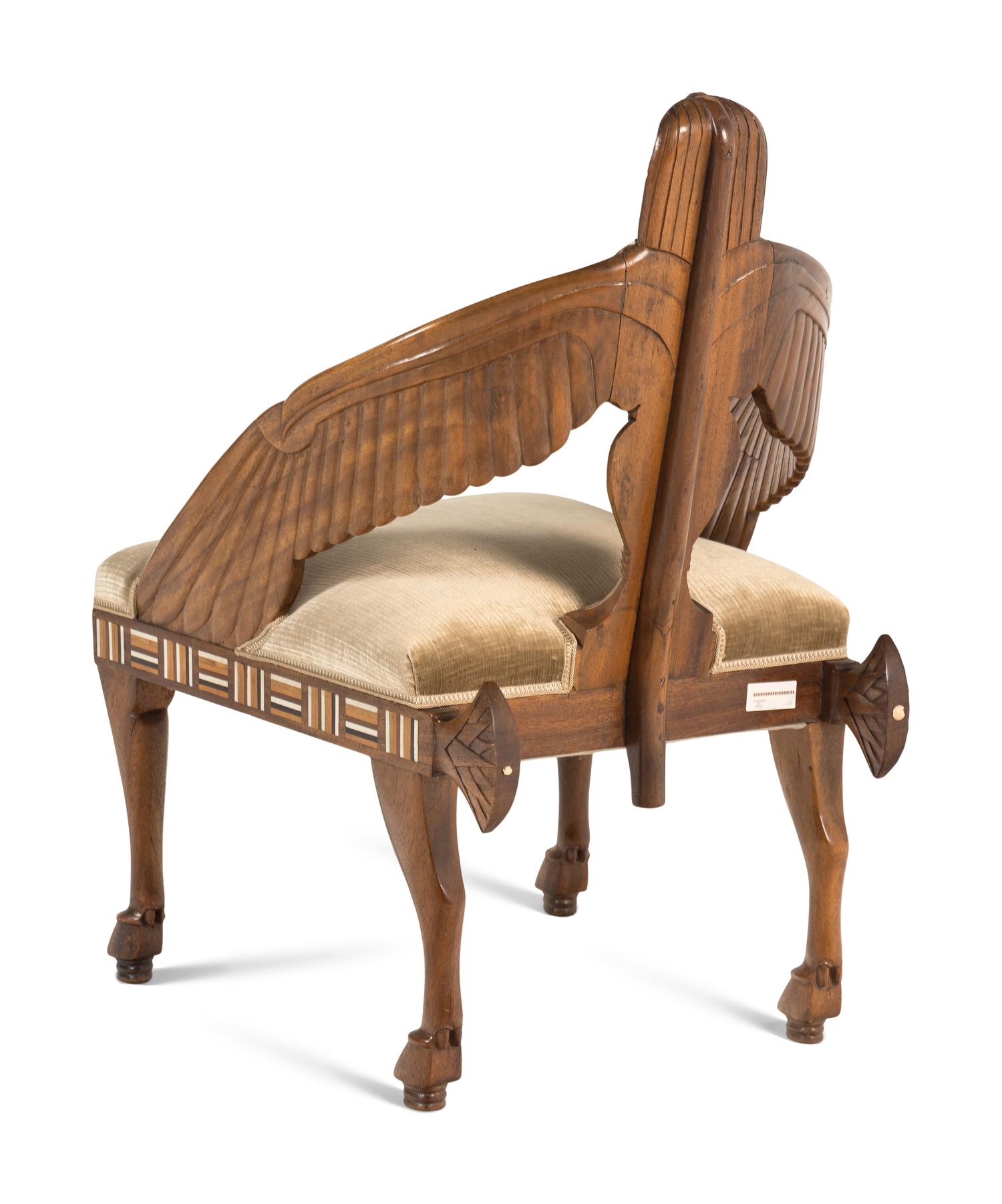 A Pair of Egyptian Revival Mother-of-Pearl Inlaid Figural Armchairs