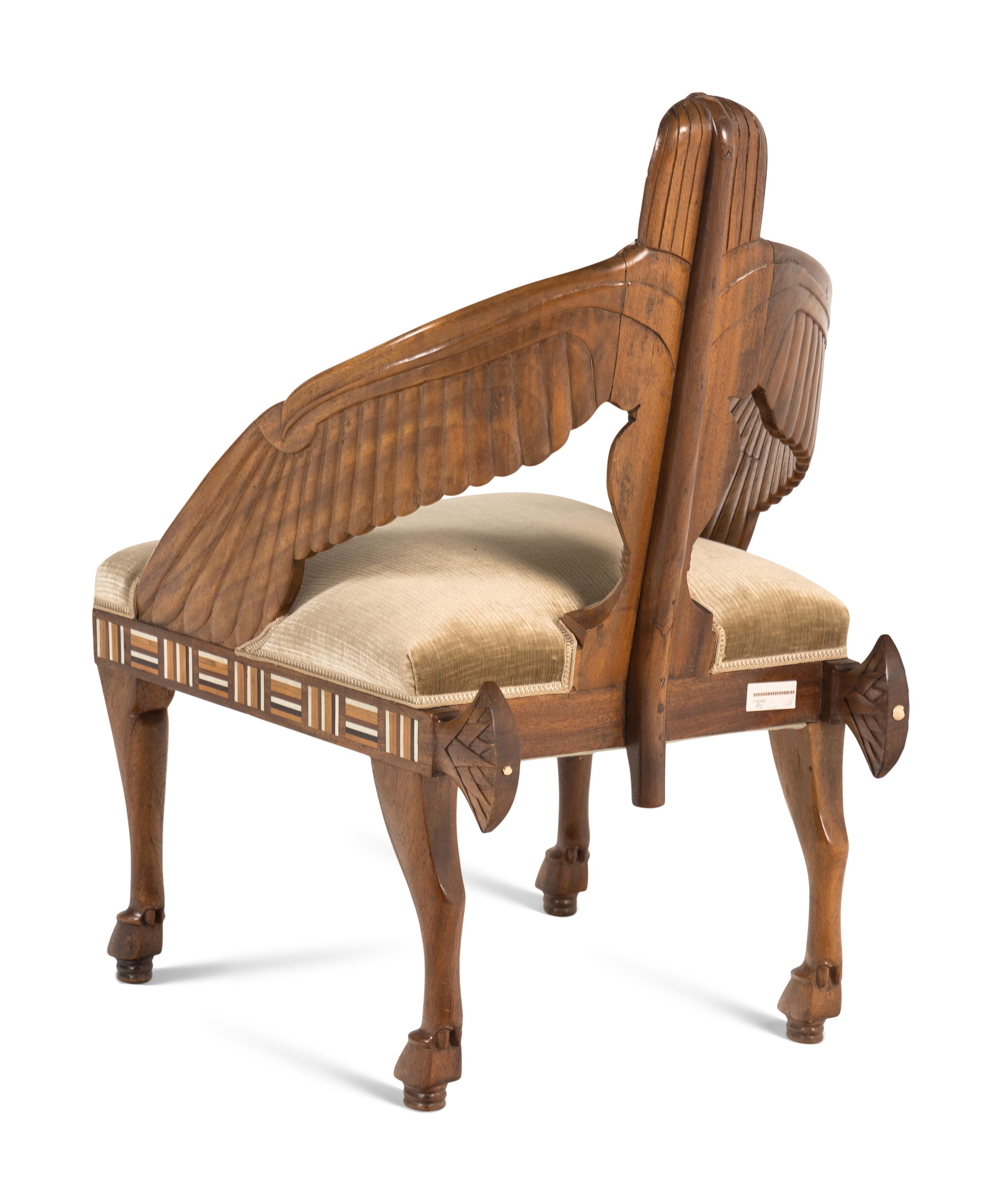 A Pair of Egyptian Revival Mother-of-Pearl Inlaid Figural Armchairs