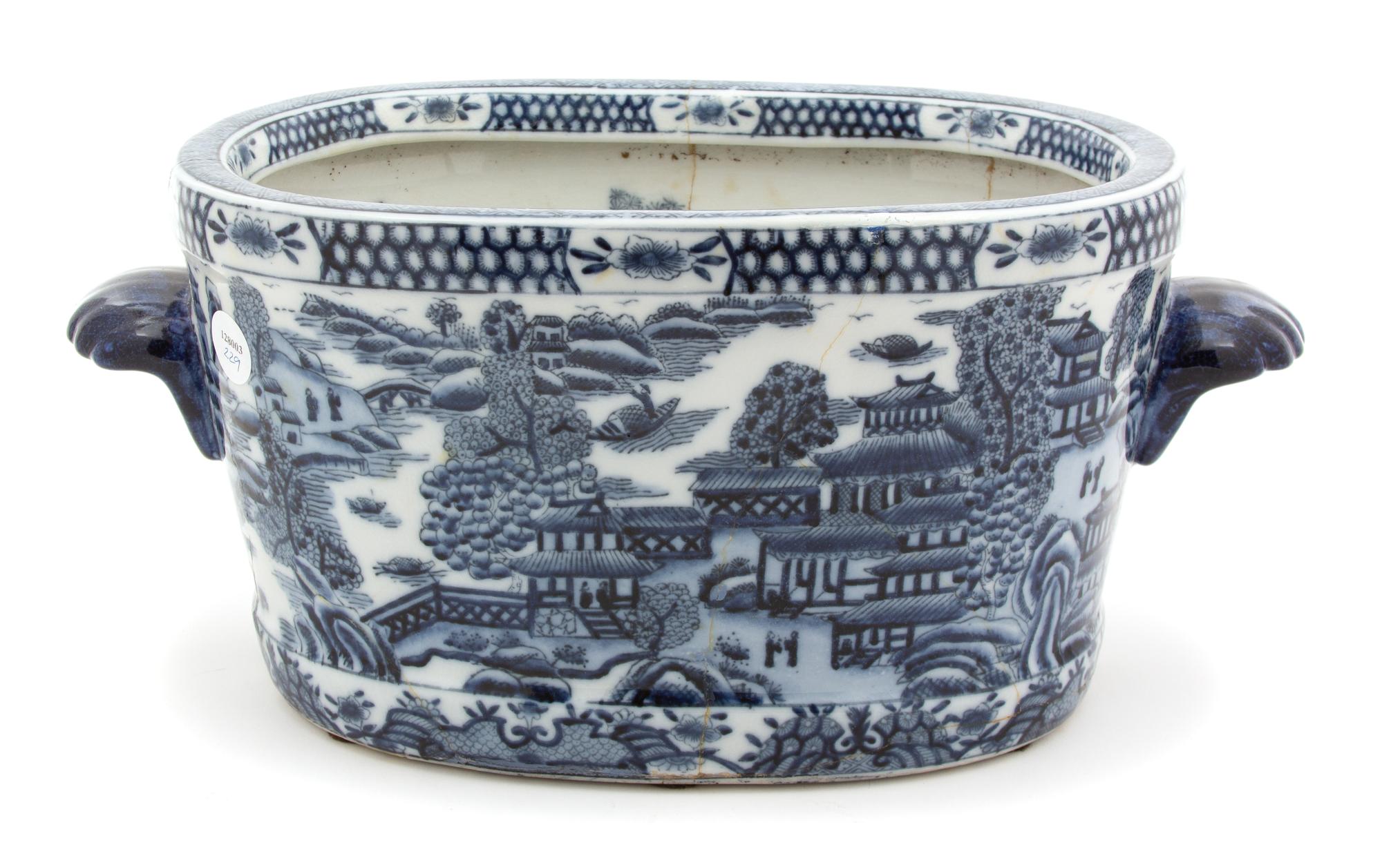 A Chinese Export Blue and White Porcelain Jardiniere Height 8 x length 18 inches. — 19TH CENTURY