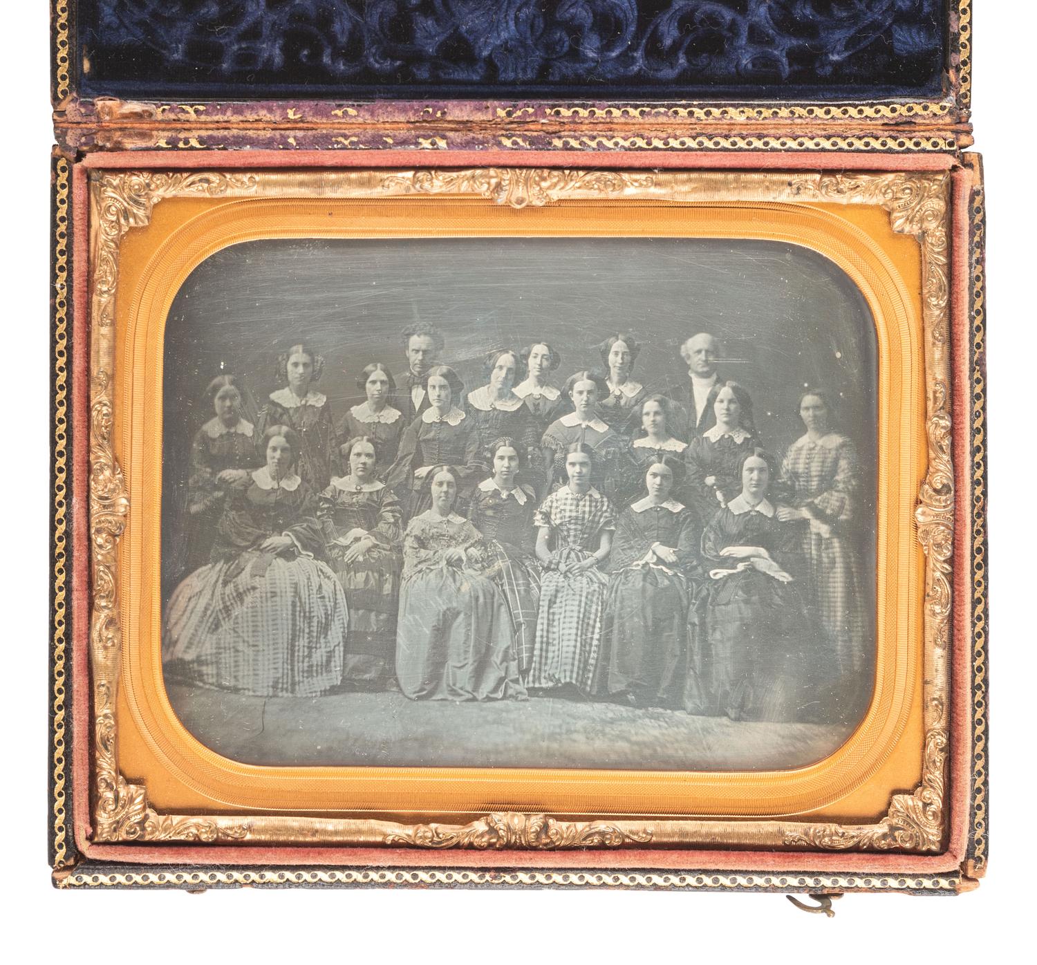 [EARLY PHOTOGRAPHY]. A pair of half plate daguerreotypes featuring groups of women, incl. a portrait of a large female class and a smaller group portrait by MEAD BROTHERS, NY.
