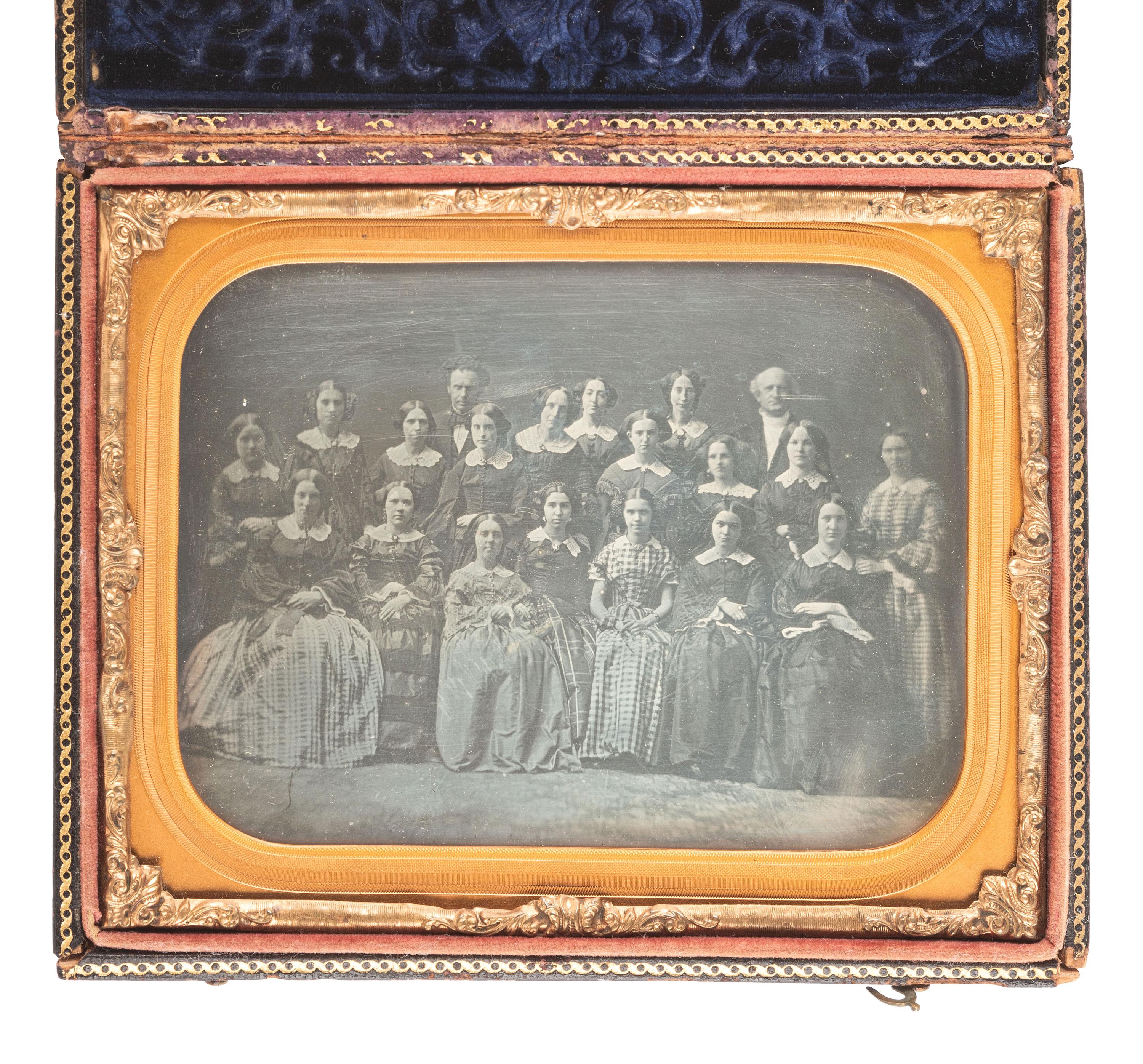 [EARLY PHOTOGRAPHY]. A pair of half plate daguerreotypes featuring groups of women, incl. a portrait of a large female class and a smaller group portrait by MEAD BROTHERS, NY.