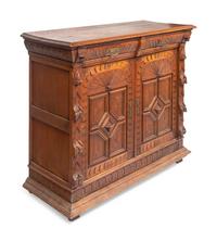 A Renaissance Revival Carved Oak Cabinet