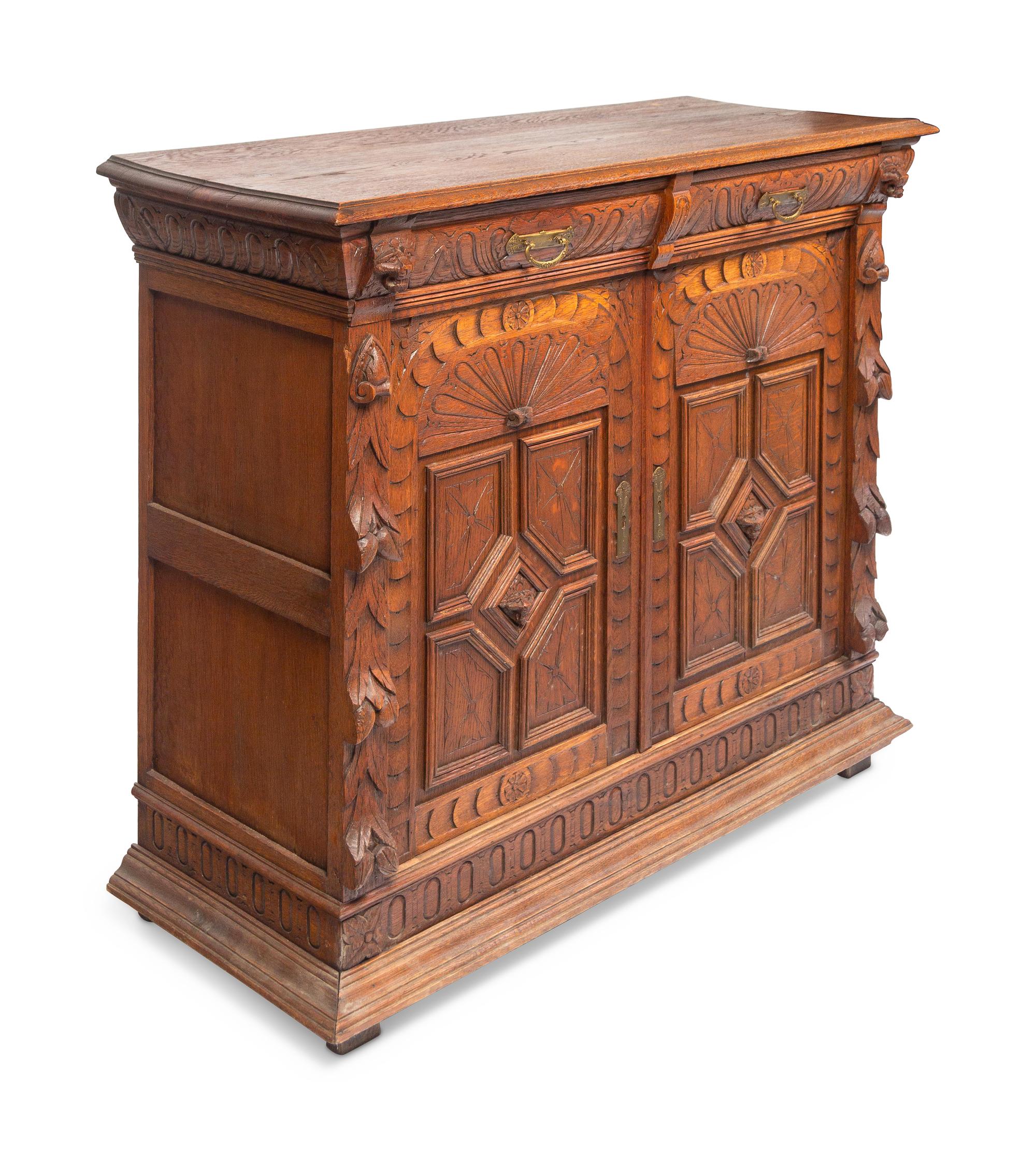 A Renaissance Revival Carved Oak Cabinet