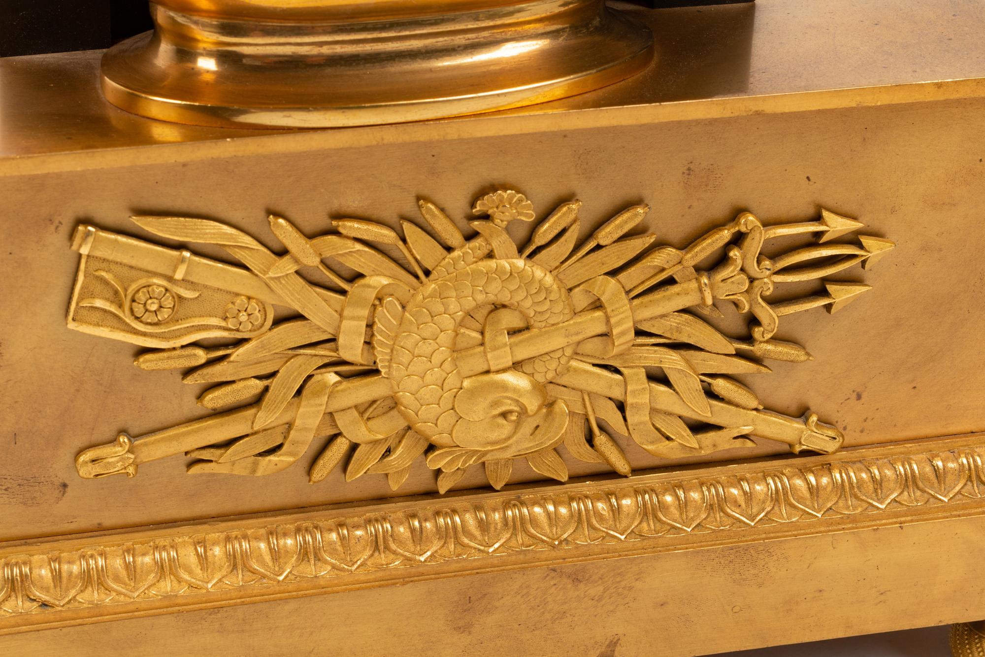 A Louis Philippe Gilt and Patinated Bronze Mantel Clock