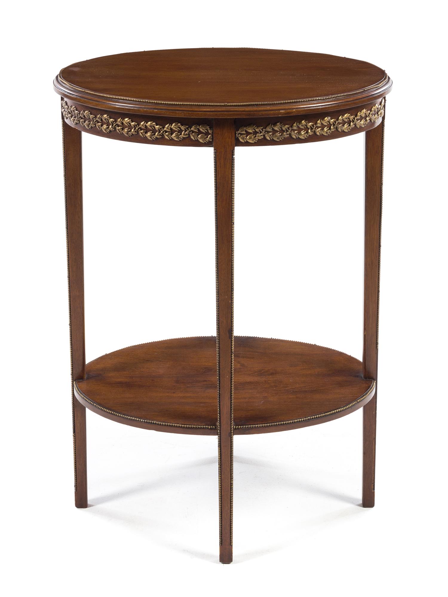A Gilt Metal Mounted Mahogany Occasional Table Height 29 x width 21 x depth 16 3/4 inches. — 20TH CENTURY