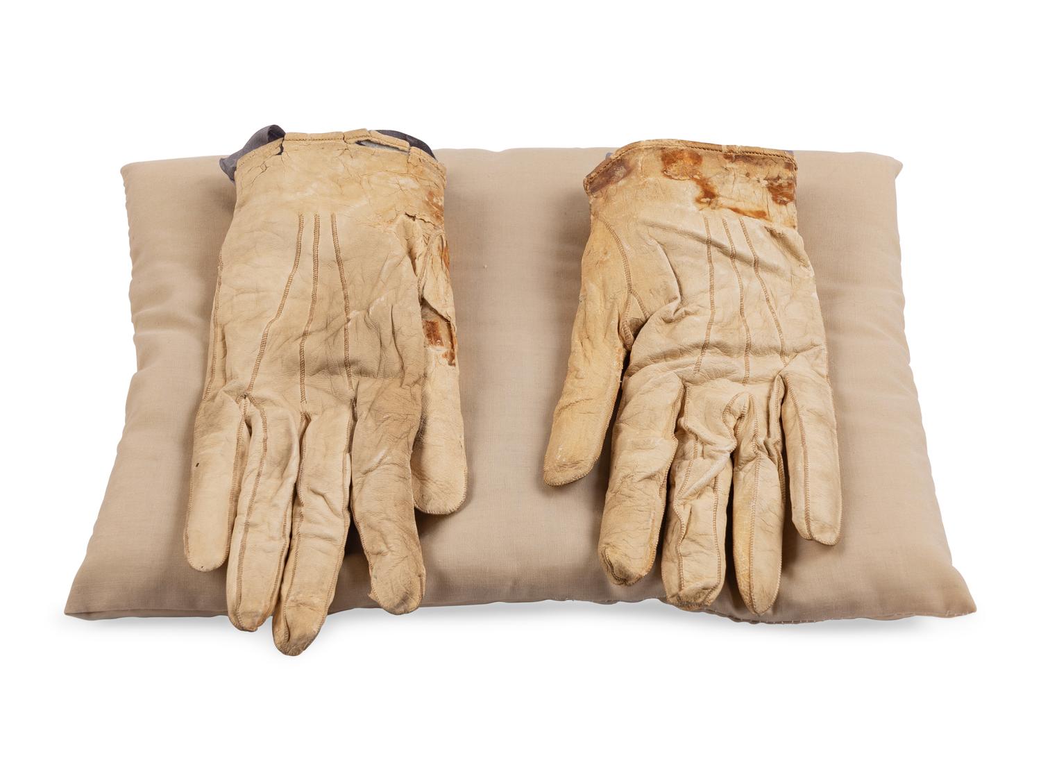 [LINCOLN ASSASSINATION]. A pair of stained leather gloves carried by President Abraham Lincoln at Ford's Theatre on the night of his assassination, 14 April 1865.