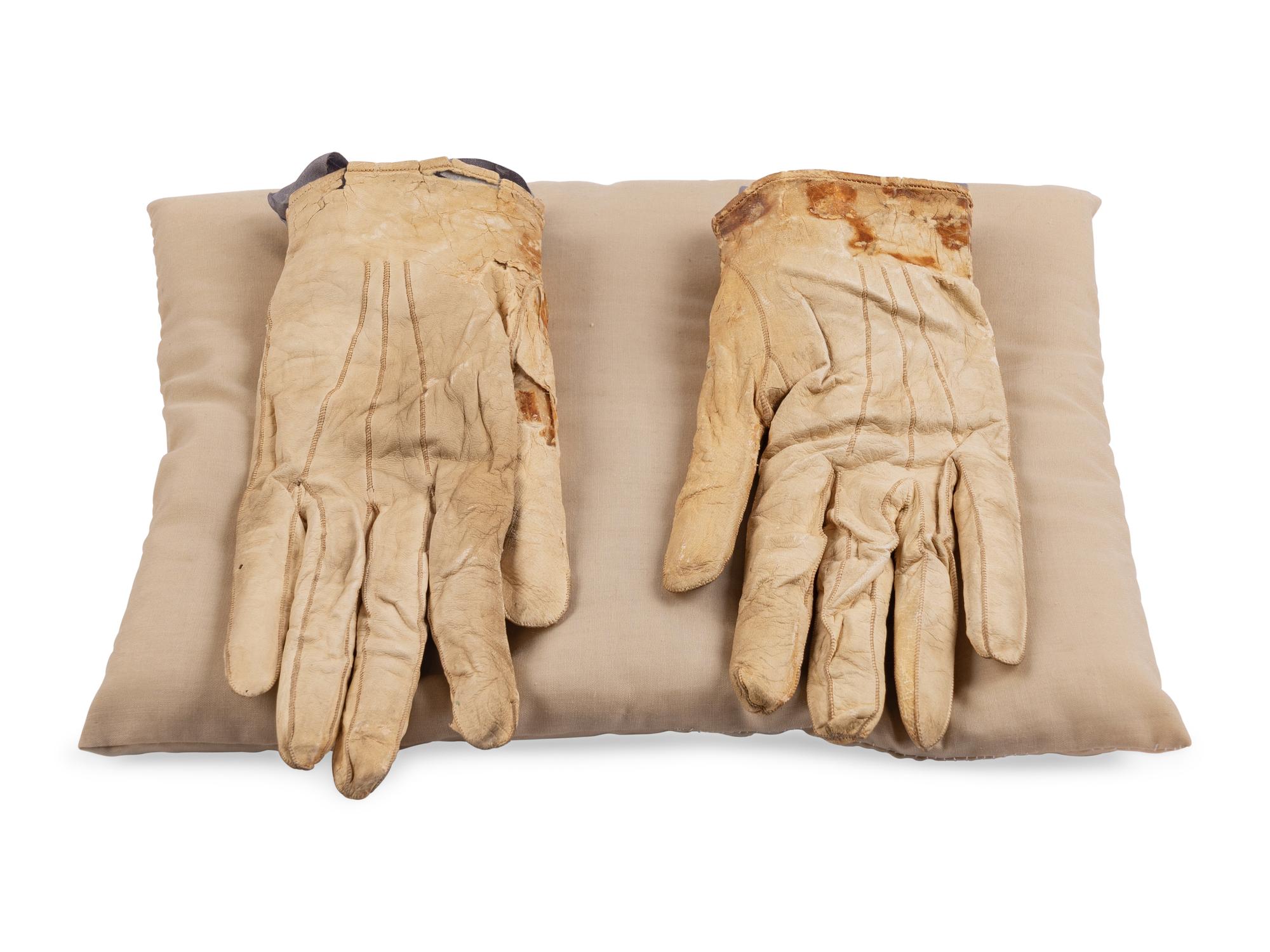 [LINCOLN ASSASSINATION]. A pair of stained leather gloves carried by President Abraham Lincoln at Ford's Theatre on the night of his assassination, 14 April 1865.