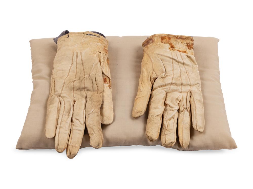 [LINCOLN ASSASSINATION]. A pair of stained leather gloves carried by President Abraham Lincoln at Ford's Theatre on the night of his assassination, 14 April 1865. 