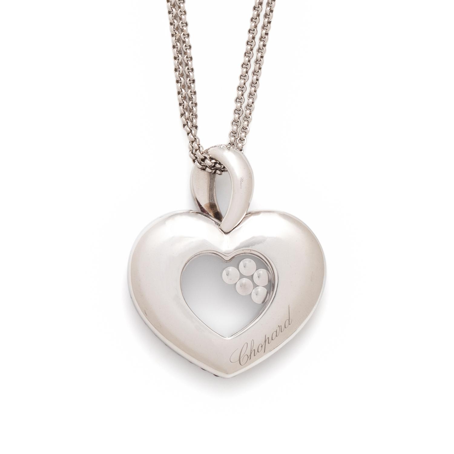 CHOPARD, RUBY AND DIAMOND 'HAPPY DIAMONDS' PENDANT/NECKLACE