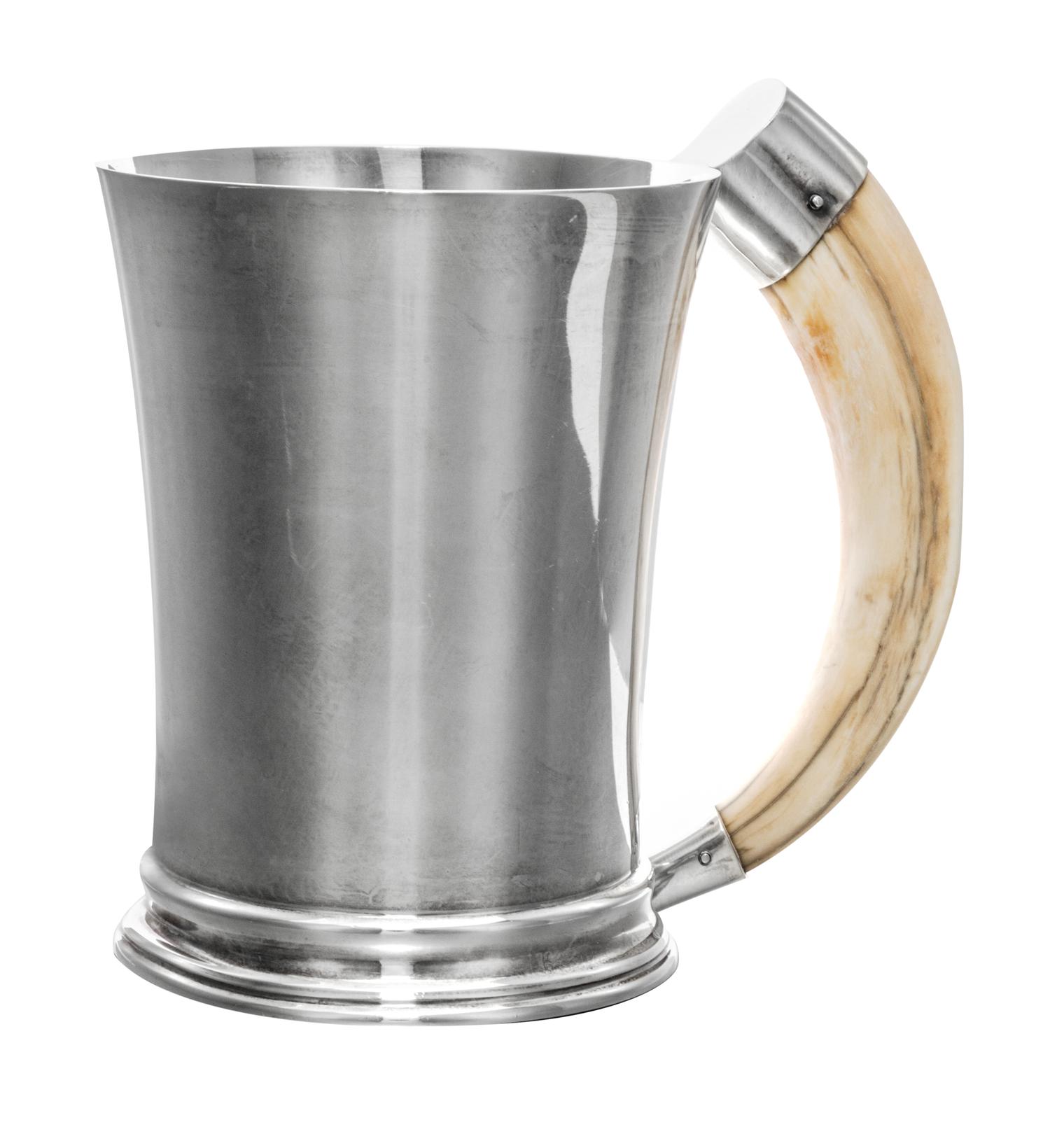 A George V Silver Mug, Hukin & Heath, Birmingham, 1919, tapering, with a boar's tusk handle.