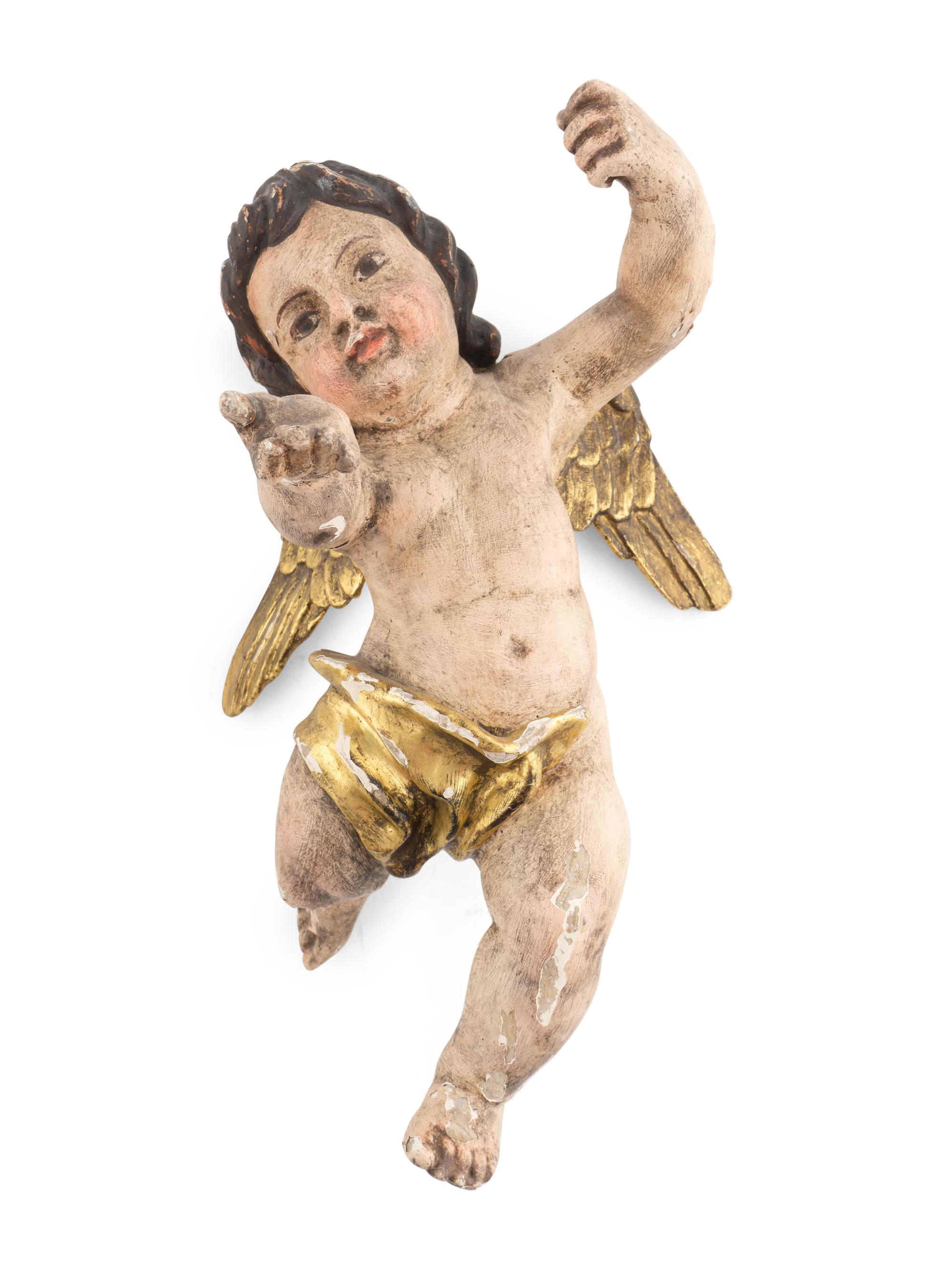 A Pair of Continental Painted and Parcel Gilt Putto Ornaments