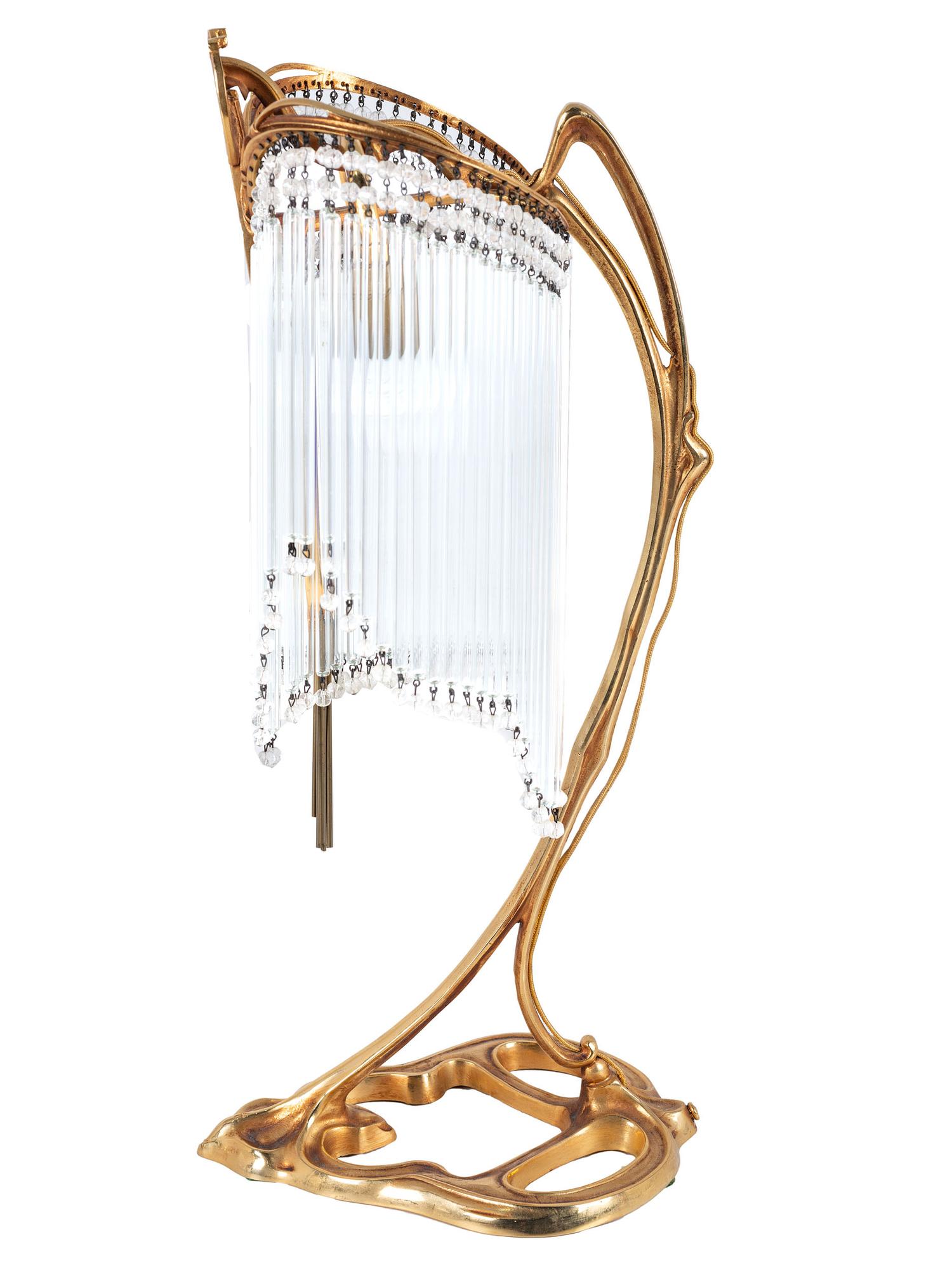 An Art Nouveau Gilt Metal and Glass Table Lamp, after Hector Guimard