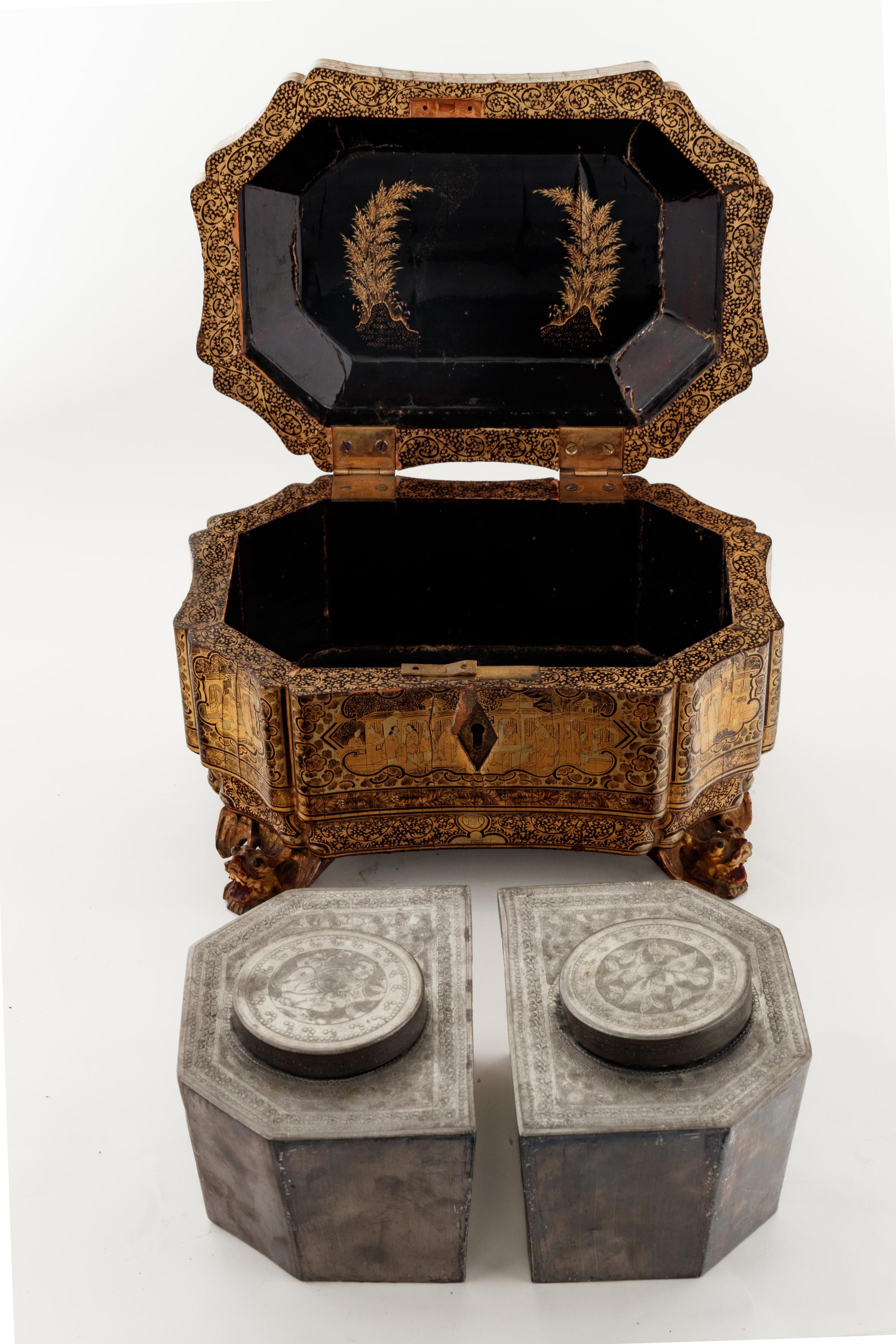 A Chinese Export Gilt Decorated Black Lacquer Tea Caddy