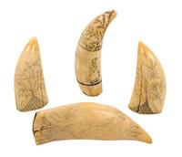 Four Engraved Scrimshaw Whale Teeth Height of tallest 6 3/4 inches. — 18TH AND 19TH CENTURY