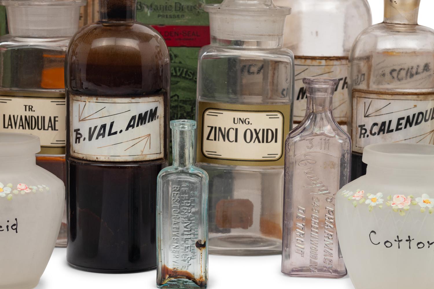 A Collection of Glass Apothecary Bottles