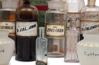 A Collection of Glass Apothecary Bottles