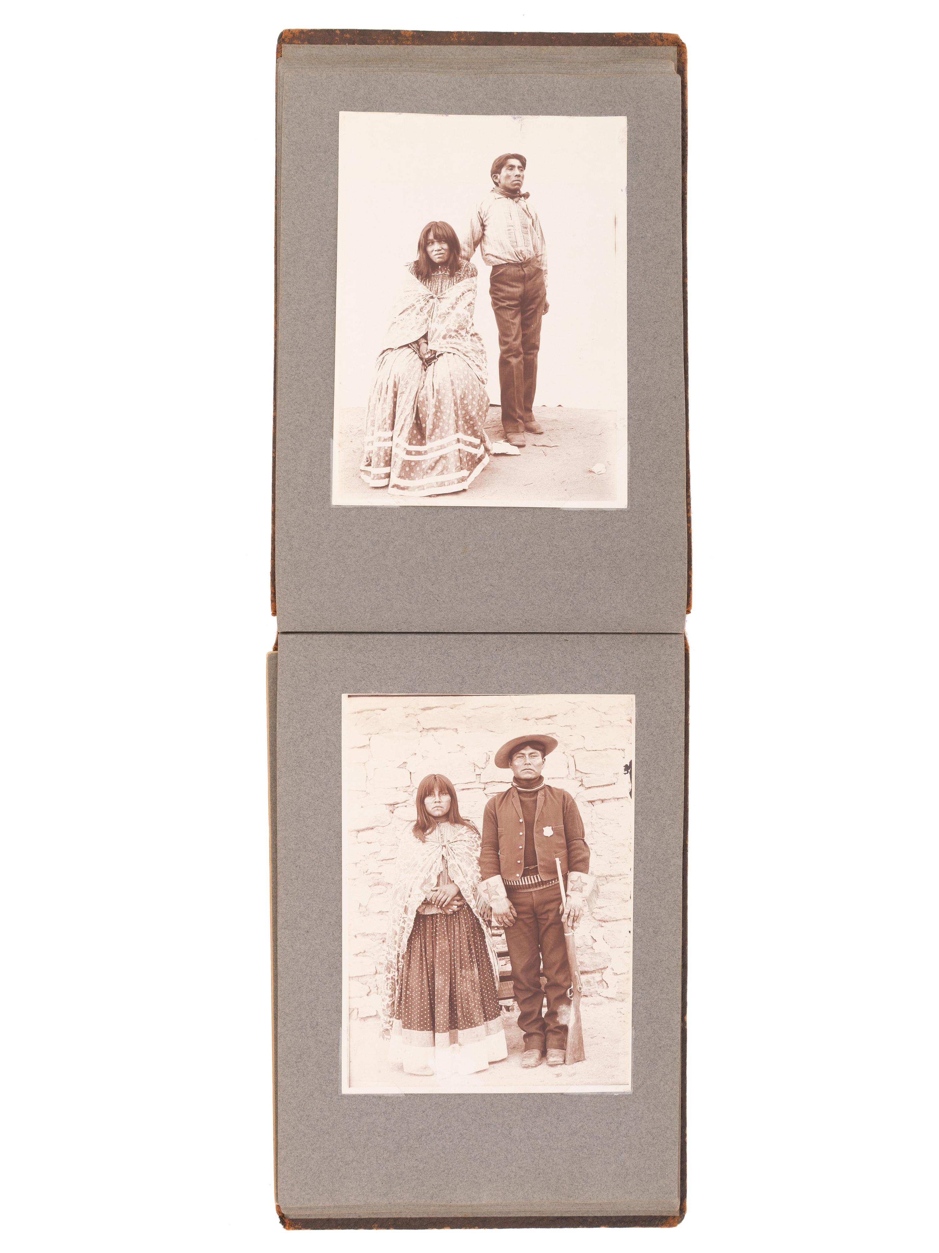 [NATIVE AMERICANS]. JONES, John Edward (1863-1922), photographer. Album containing 50 photographs of the San Carlos Indian Agency, including Apache civilians and police, agency buildings and dwellings, and scenic views. Ca 1904.