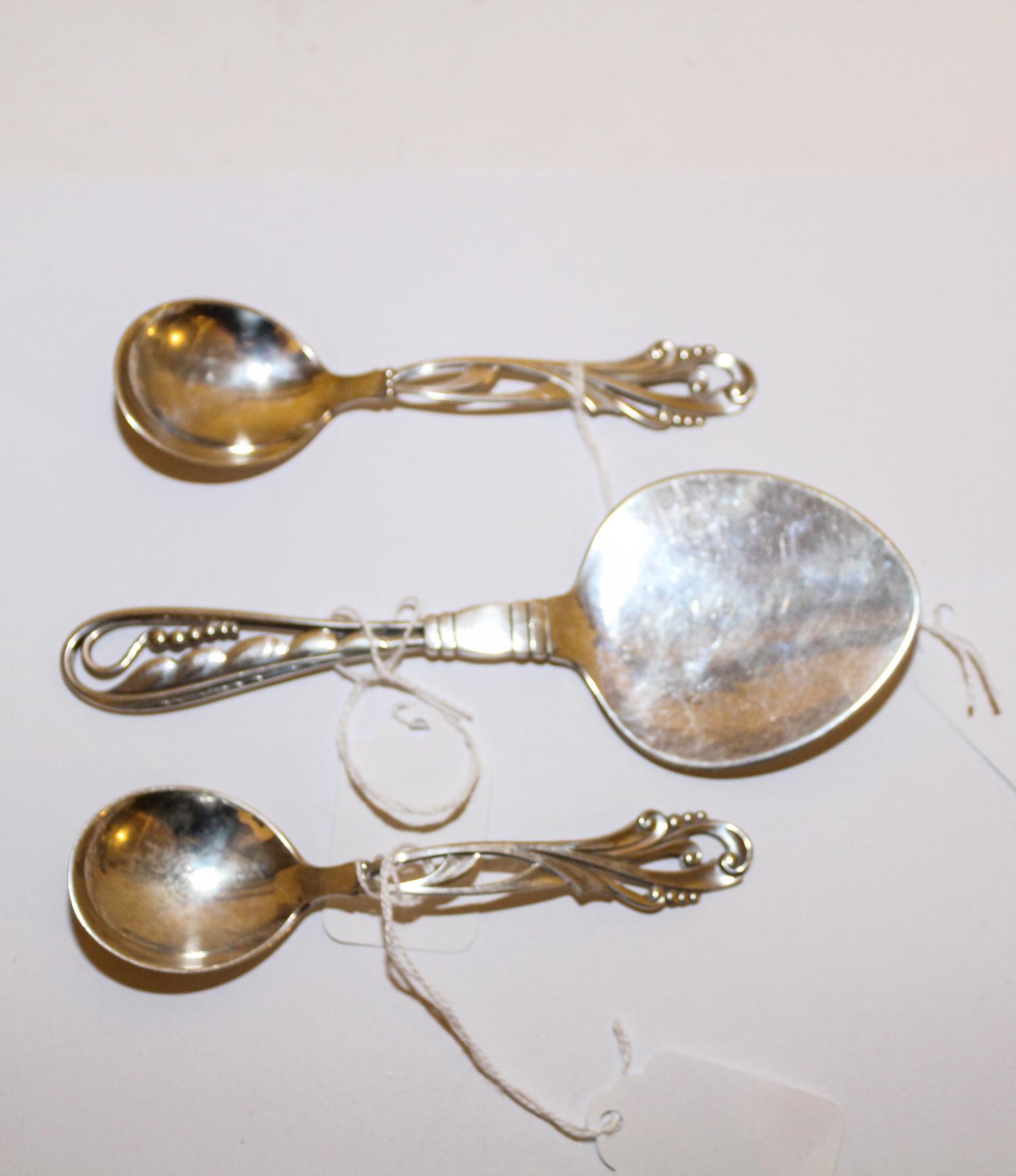 A Danish Silver Tomato Server, Georg Jensen, Copenhagen, 20th Century, pattern No. 42, together with two Danish silver coffee spoons, p