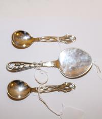 A Danish Silver Tomato Server, Georg Jensen, Copenhagen, 20th Century, pattern No. 42, together with two Danish silver coffee spoons, p