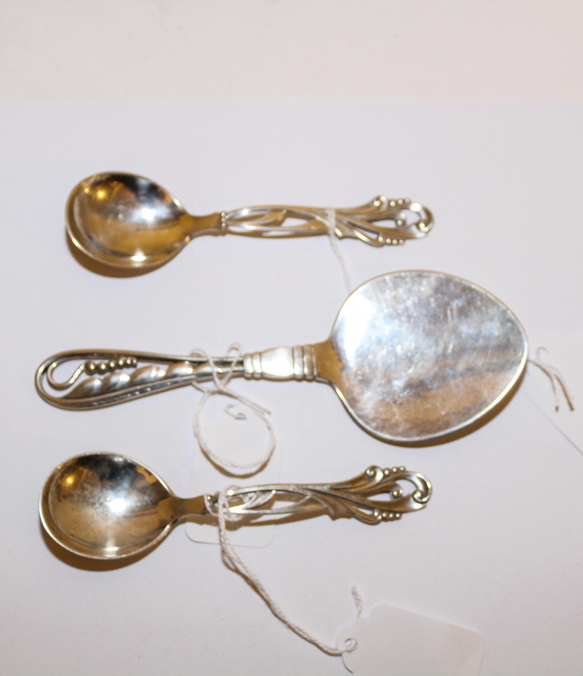 A Danish Silver Tomato Server, Georg Jensen, Copenhagen, 20th Century, pattern No. 42, together with two Danish silver coffee spoons, p