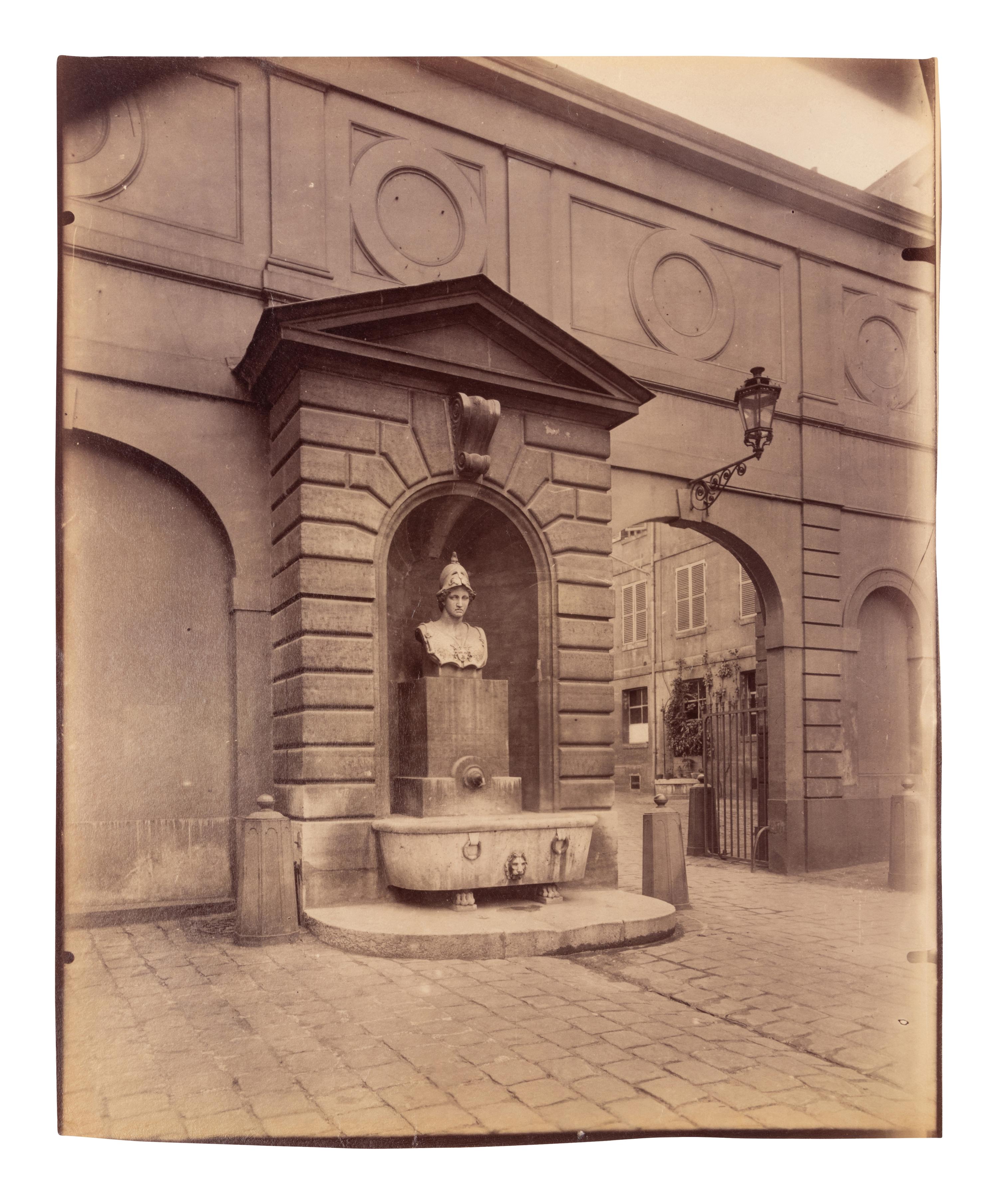 A pair of photographs depicting fountains ( Fontaine Minerve, Institut , 1899; Fontaine du Marché Saint-Honoré , 1903)