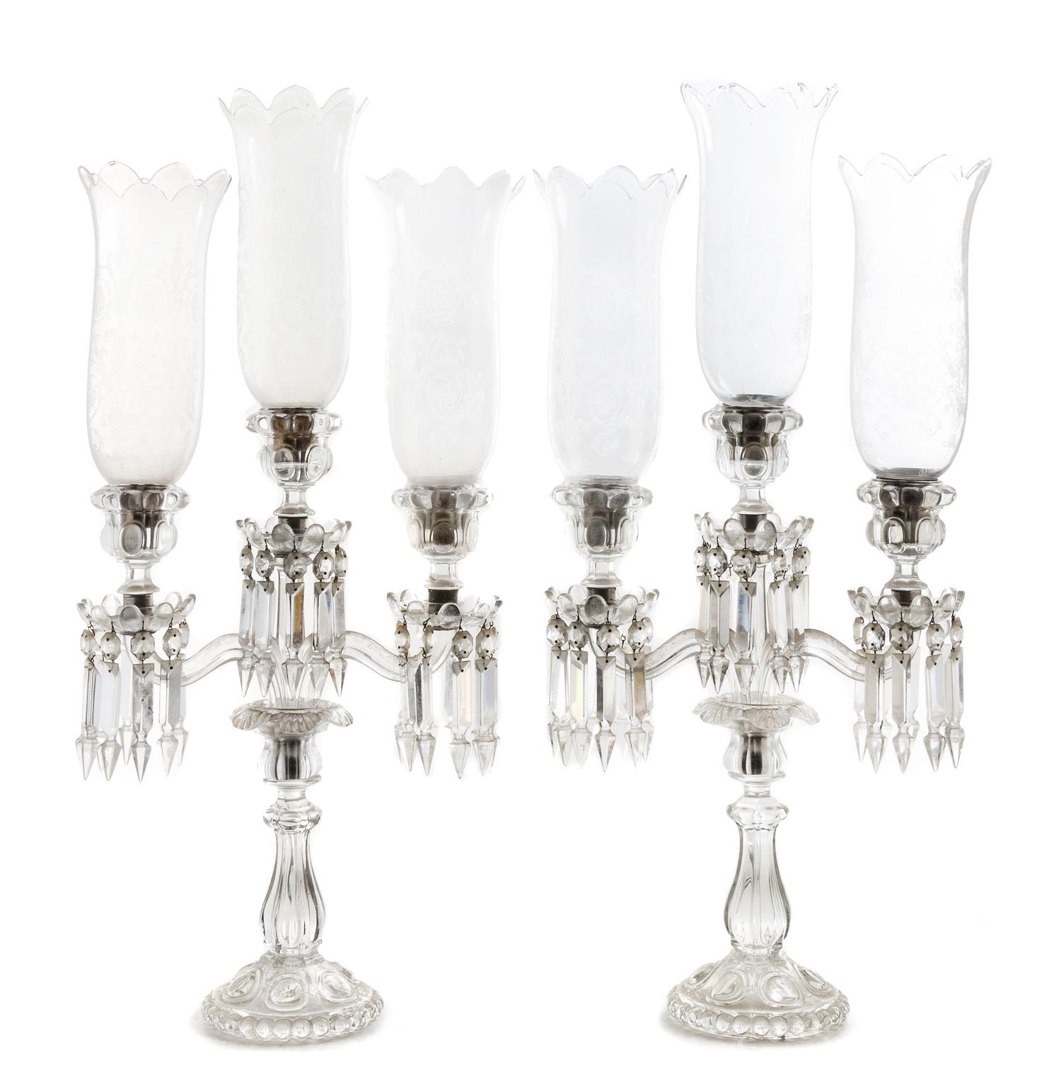 A Pair of Baccarat Glass Three-Light Candelabra Height 26 1/2 inches.