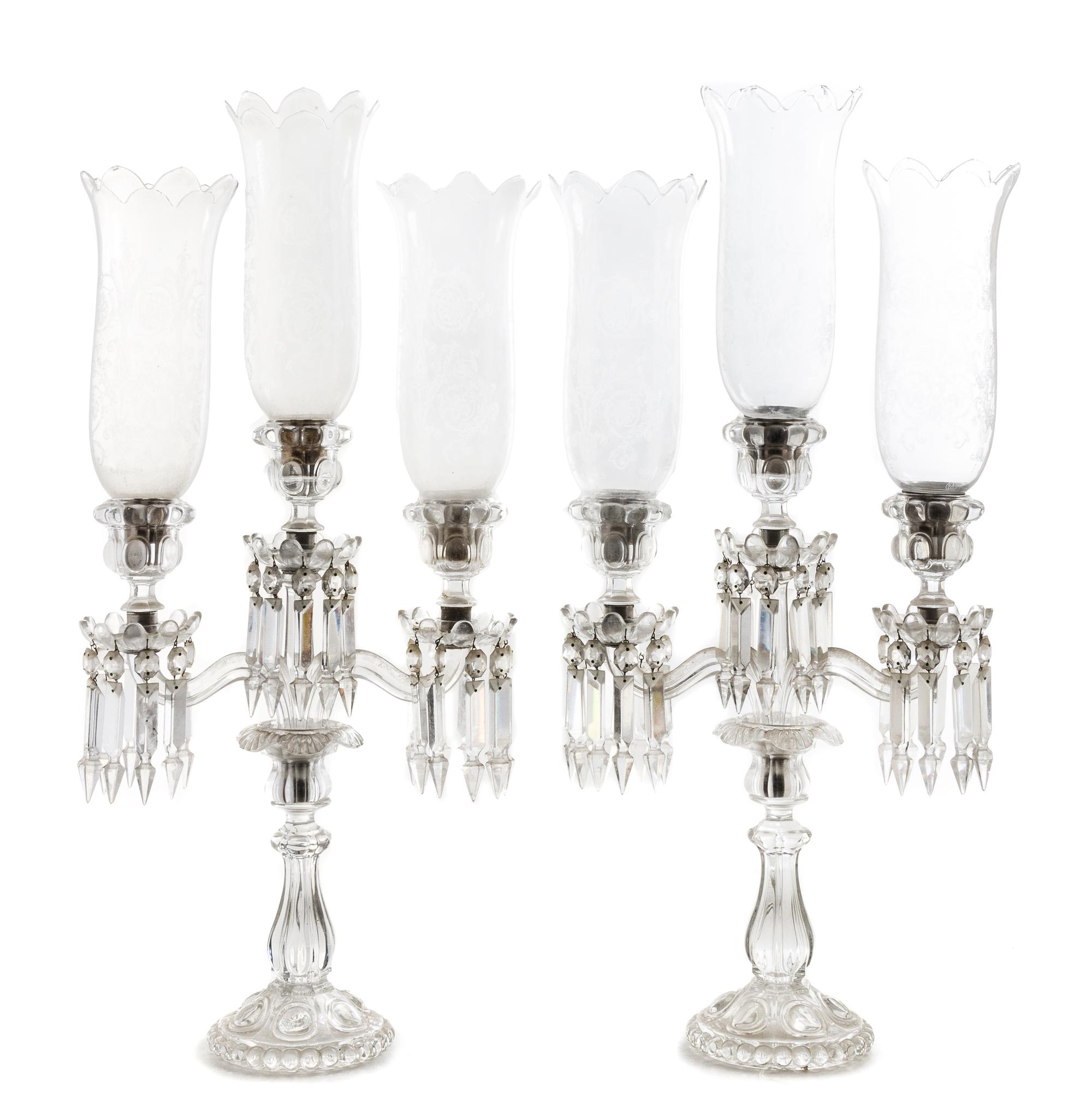 A Pair of Baccarat Glass Three-Light Candelabra Height 26 1/2 inches.