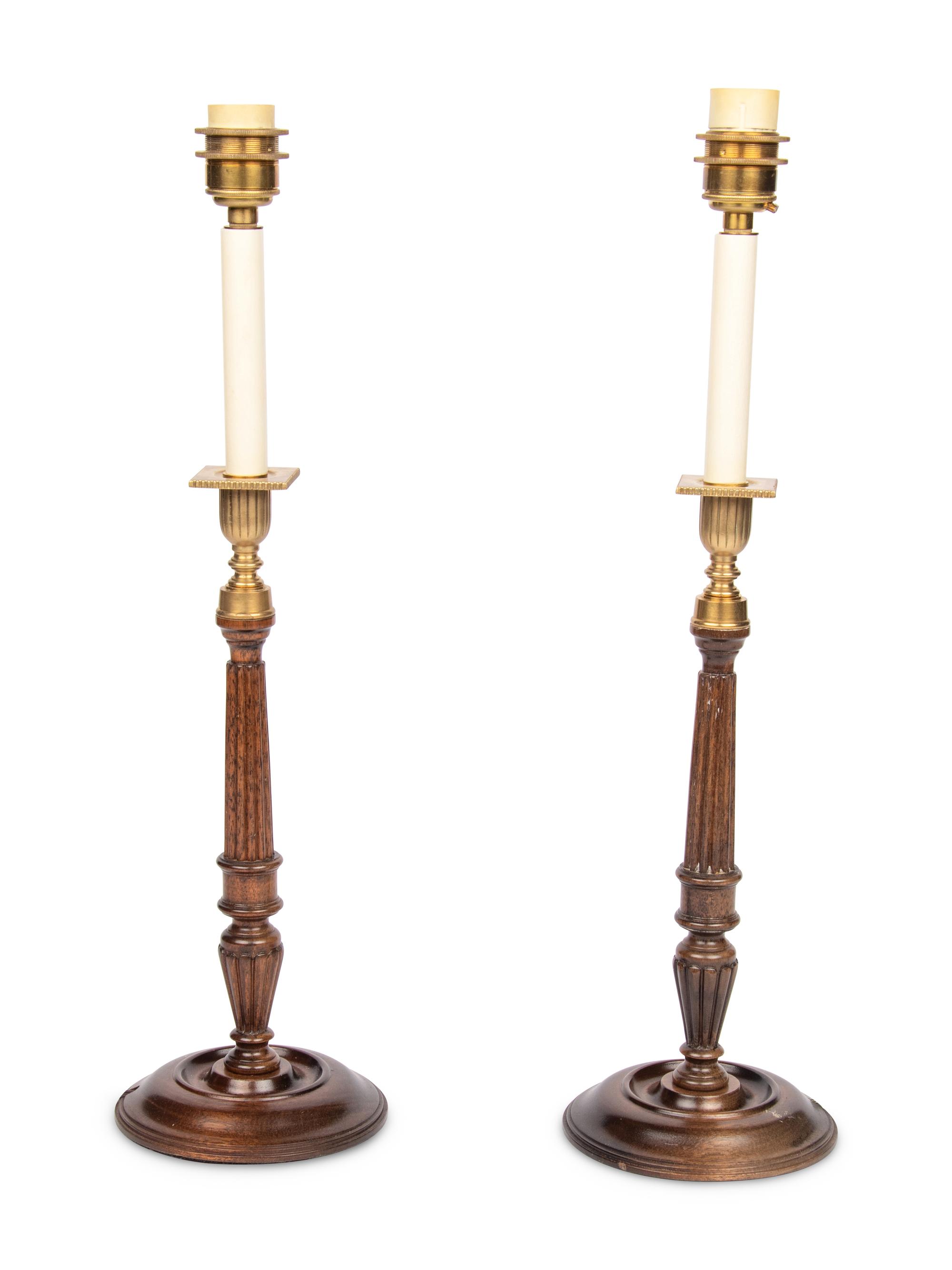 A Pair of Brass Mounted Mahogany Candlesticks
