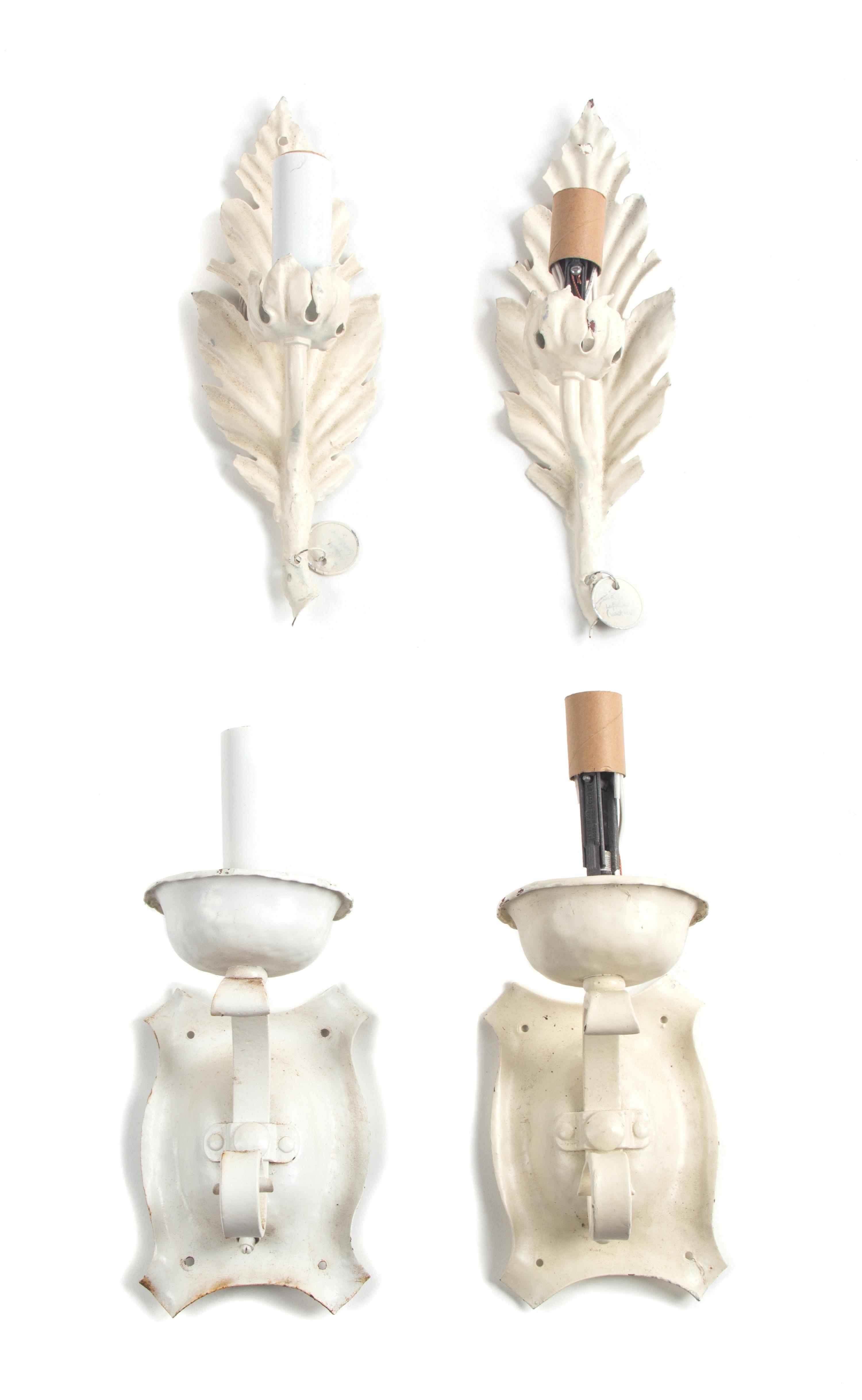 A Collection of Metal Wall Lights Height overall of largest 14 inches.