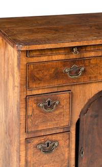 A George I Walnut Kneehole Desk