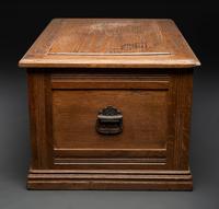 An Oak Three-Drawer Apothecary Cabinet with Specimen Tins