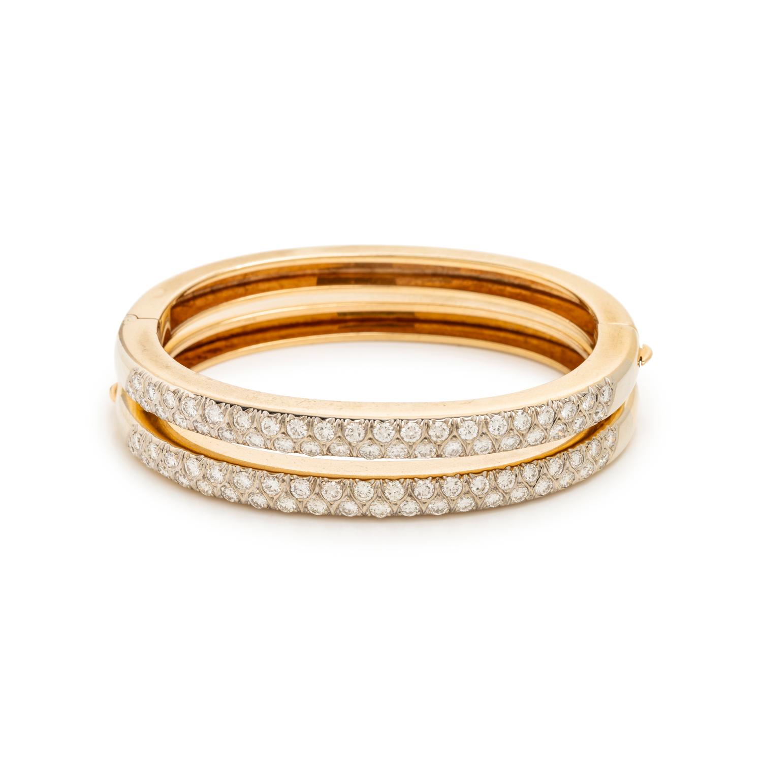 PAIR OF BICOLOR GOLD AND DIAMOND BANGLE BRACELETS