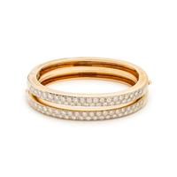 PAIR OF BICOLOR GOLD AND DIAMOND BANGLE BRACELETS