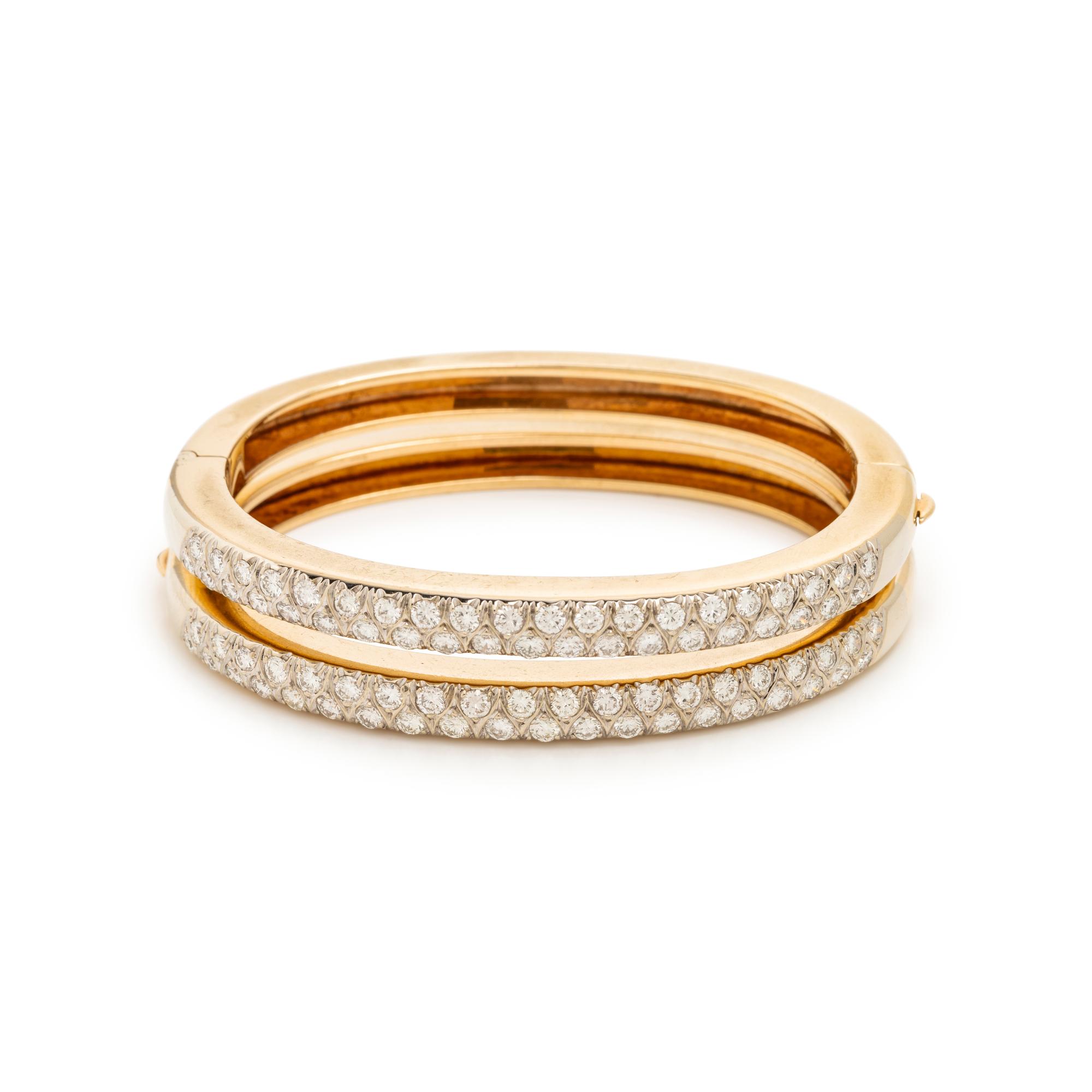 PAIR OF BICOLOR GOLD AND DIAMOND BANGLE BRACELETS