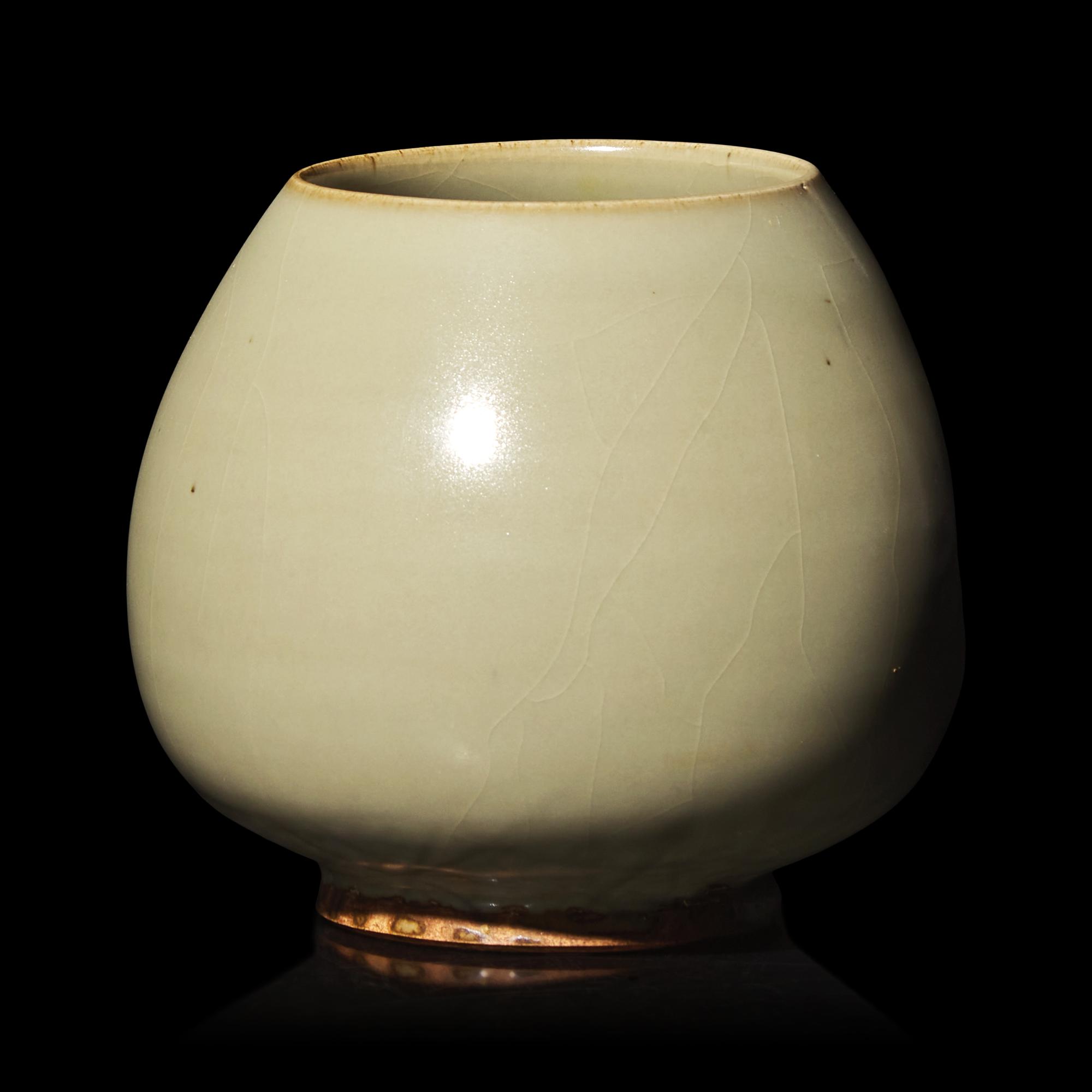 A Chinese Green-Glazed 'Lotus Bud' Vessel, Junyao or Ruzhou Donggou Kilns, Jin Dynasty 金 鈞窯或汝洲東溝窰綠釉鷄心罐