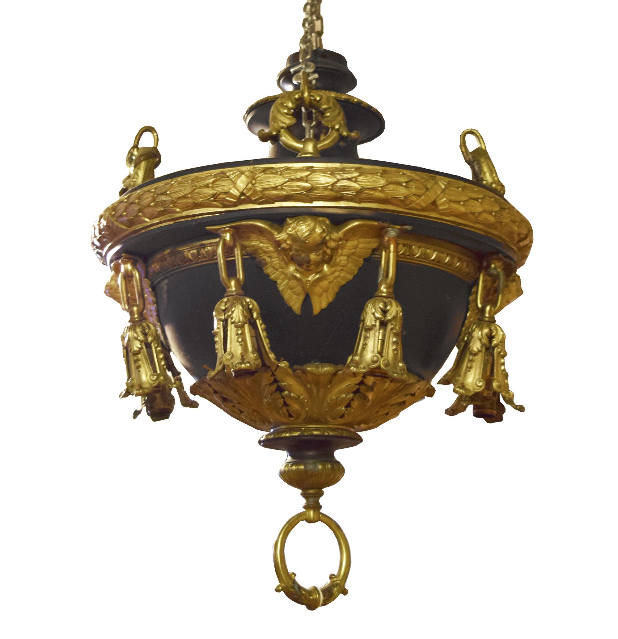 A Pair of Bronze Chandeliers with Cherub Masks 24" W x 24" D x 58" H — United States, Circa 1900