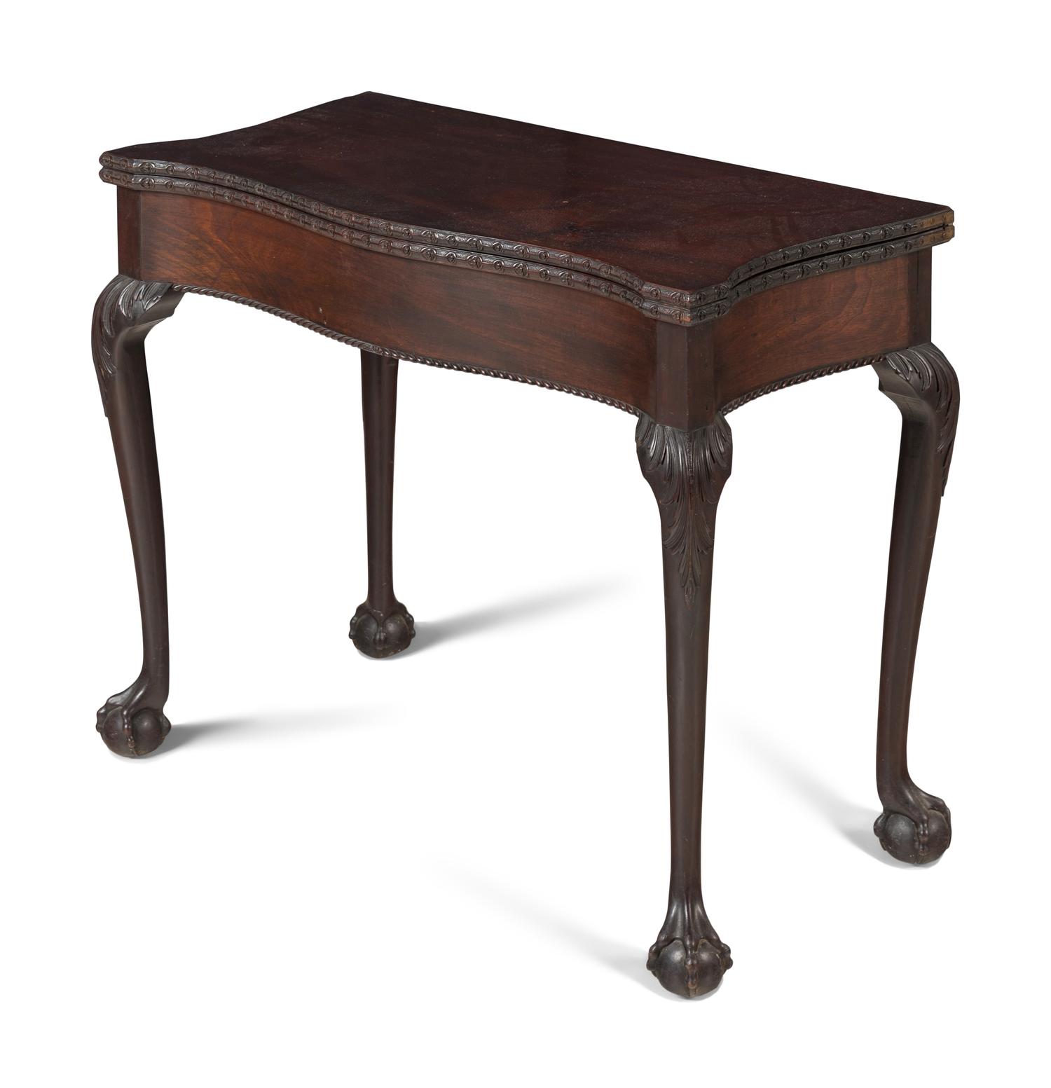 A George III Carved Mahogany Flip-Top Table