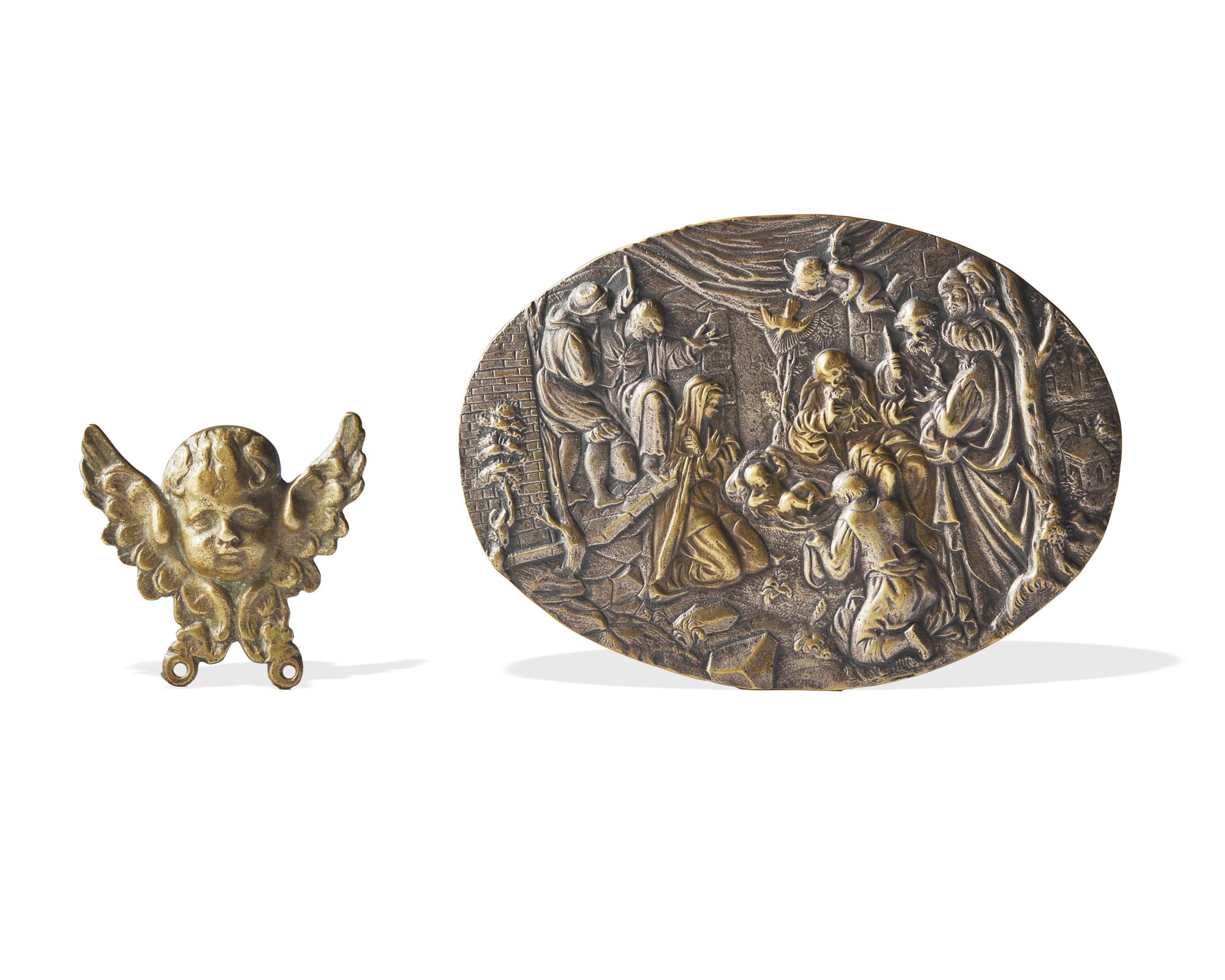 A bronze bas relief plaque depicting the Adoration of the Magi and a bronze applique depicting a winged putto head, Northern European, late 16th / 17th century