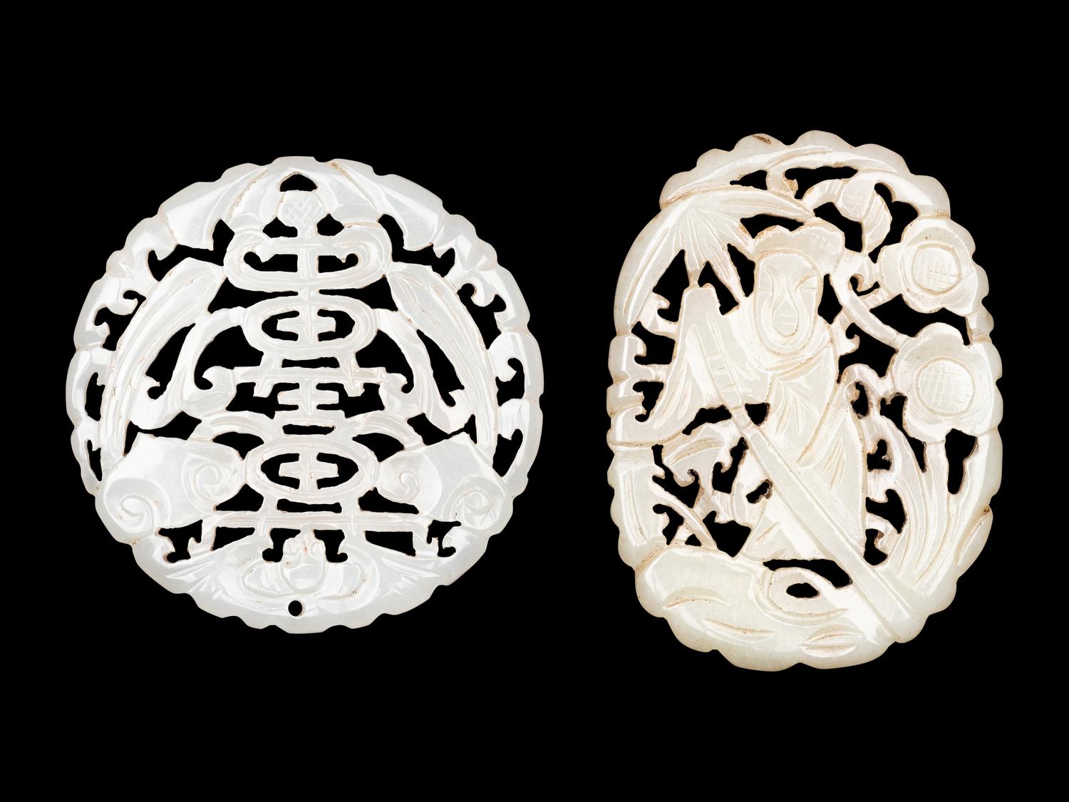 Two Chinese Pale Celadon Jade Reticulated Pendants