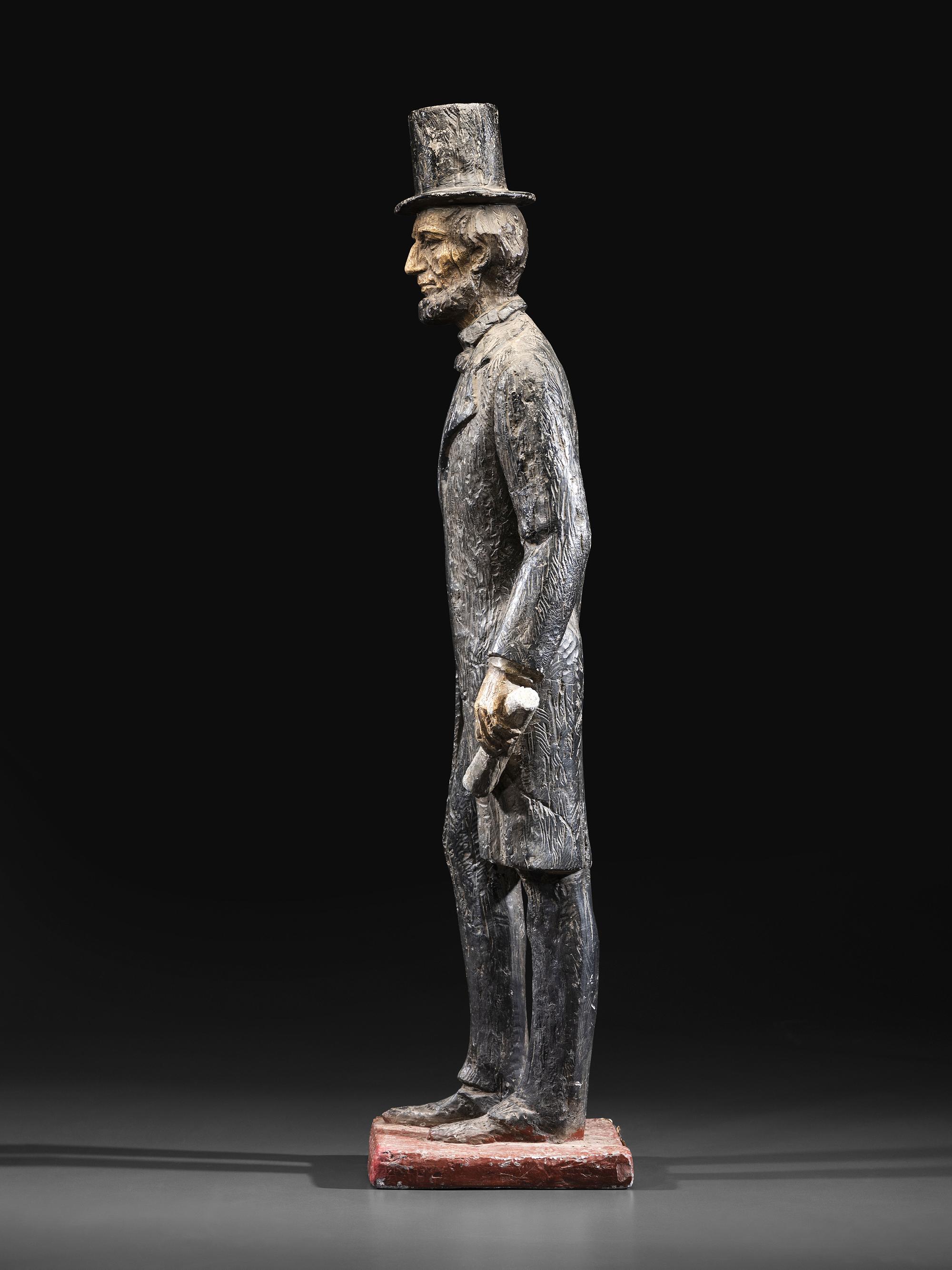 A Painted Faux Bois Cast Plaster Abraham Lincoln Statue