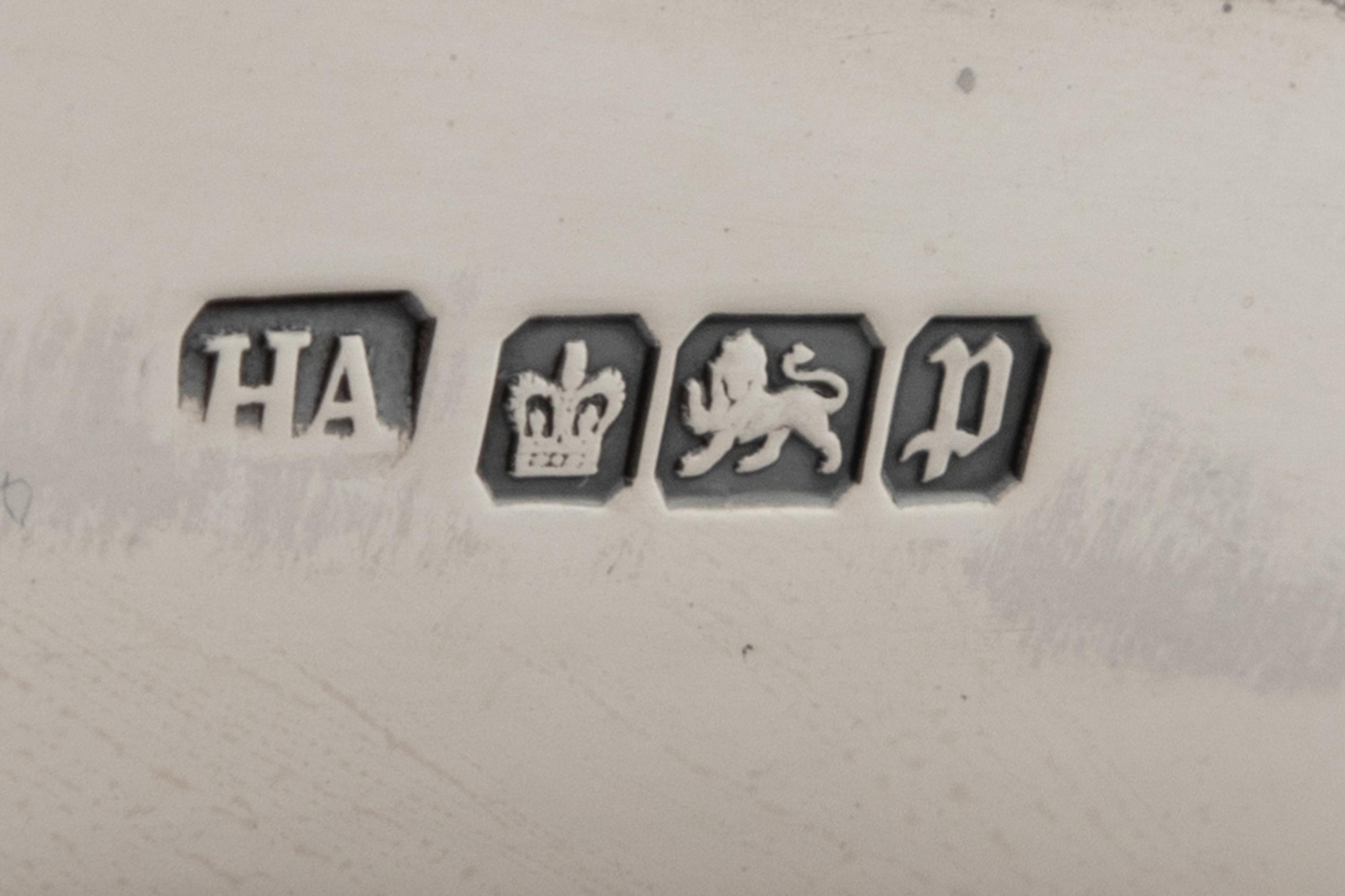 A Group of Four English Silver Table Articles