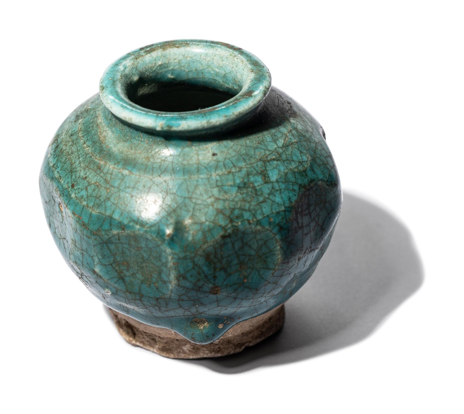 A Persian Turquoise-Glazed Vessel